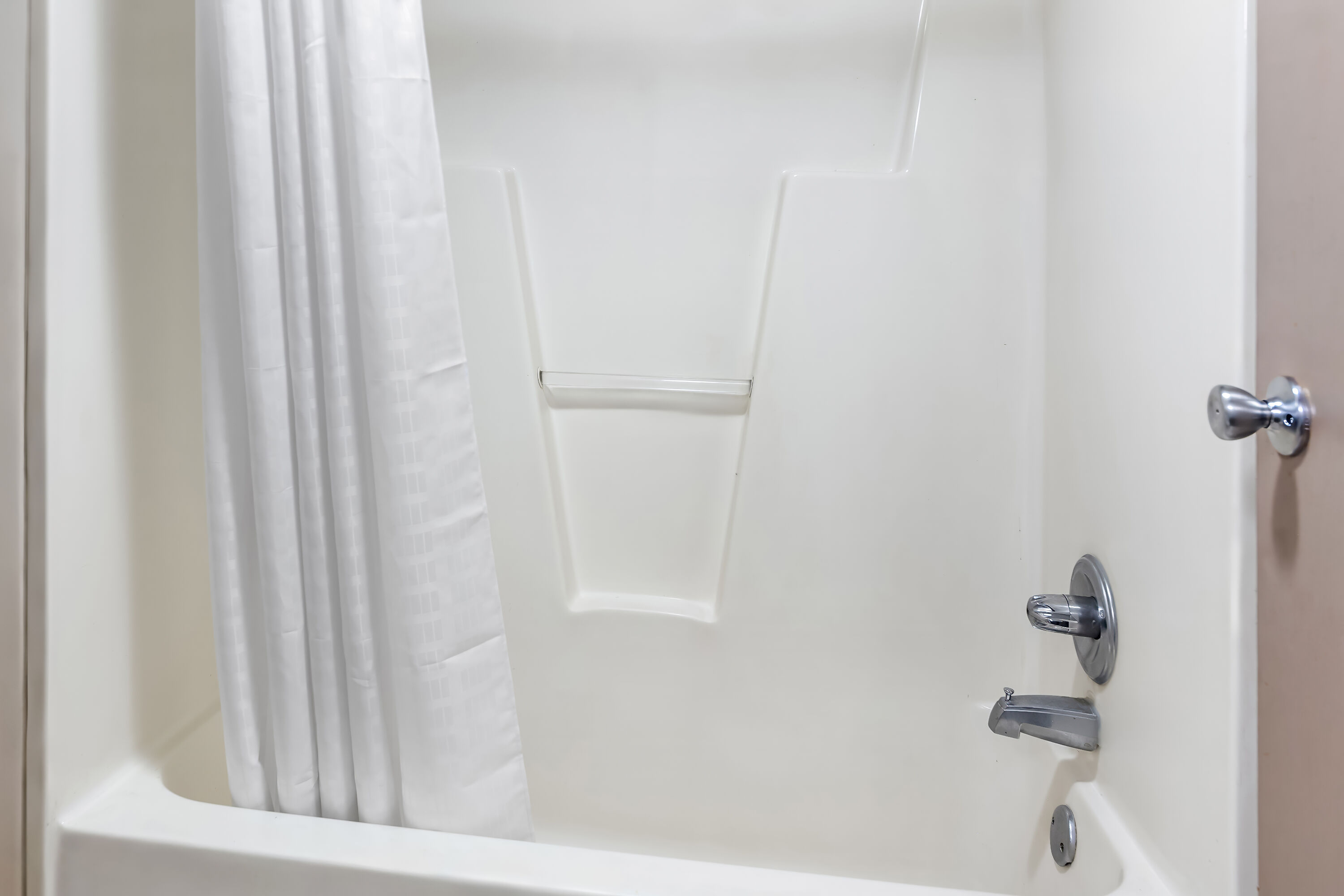 Guest room bath at the Super 8 by Wyndham Columbia in Columbia, South Carolina