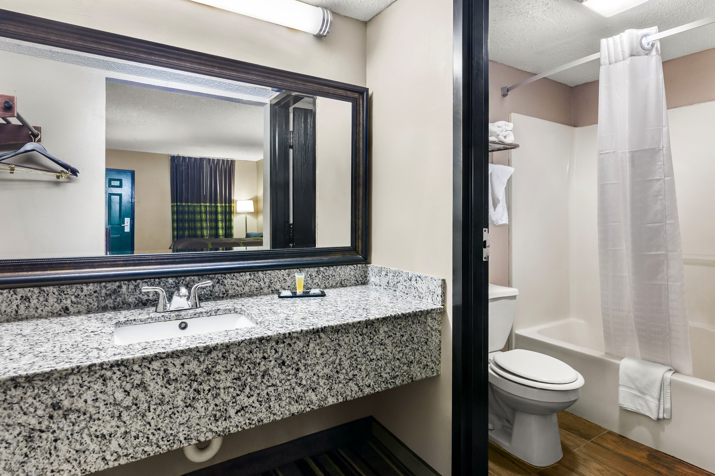 Guest room bath at the Super 8 by Wyndham Columbia in Columbia, South Carolina