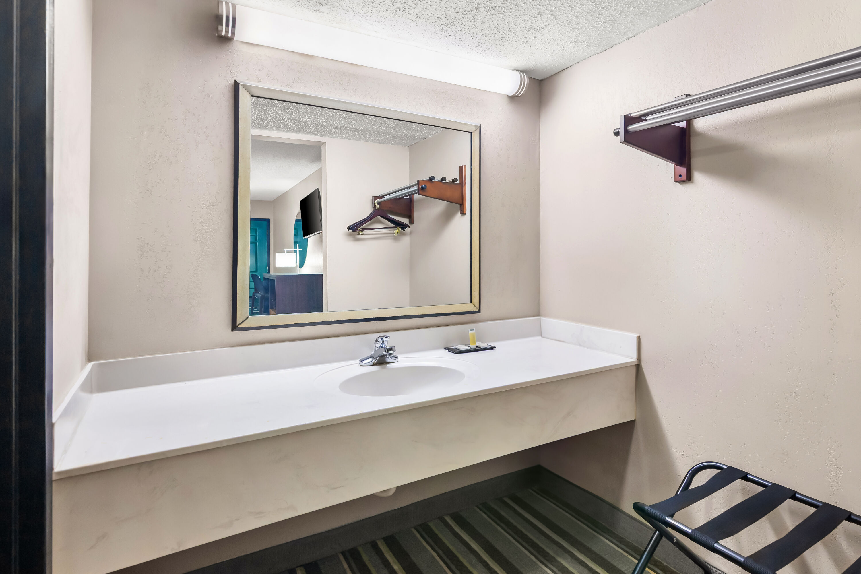 Guest room bath at the Super 8 by Wyndham Columbia in Columbia, South Carolina