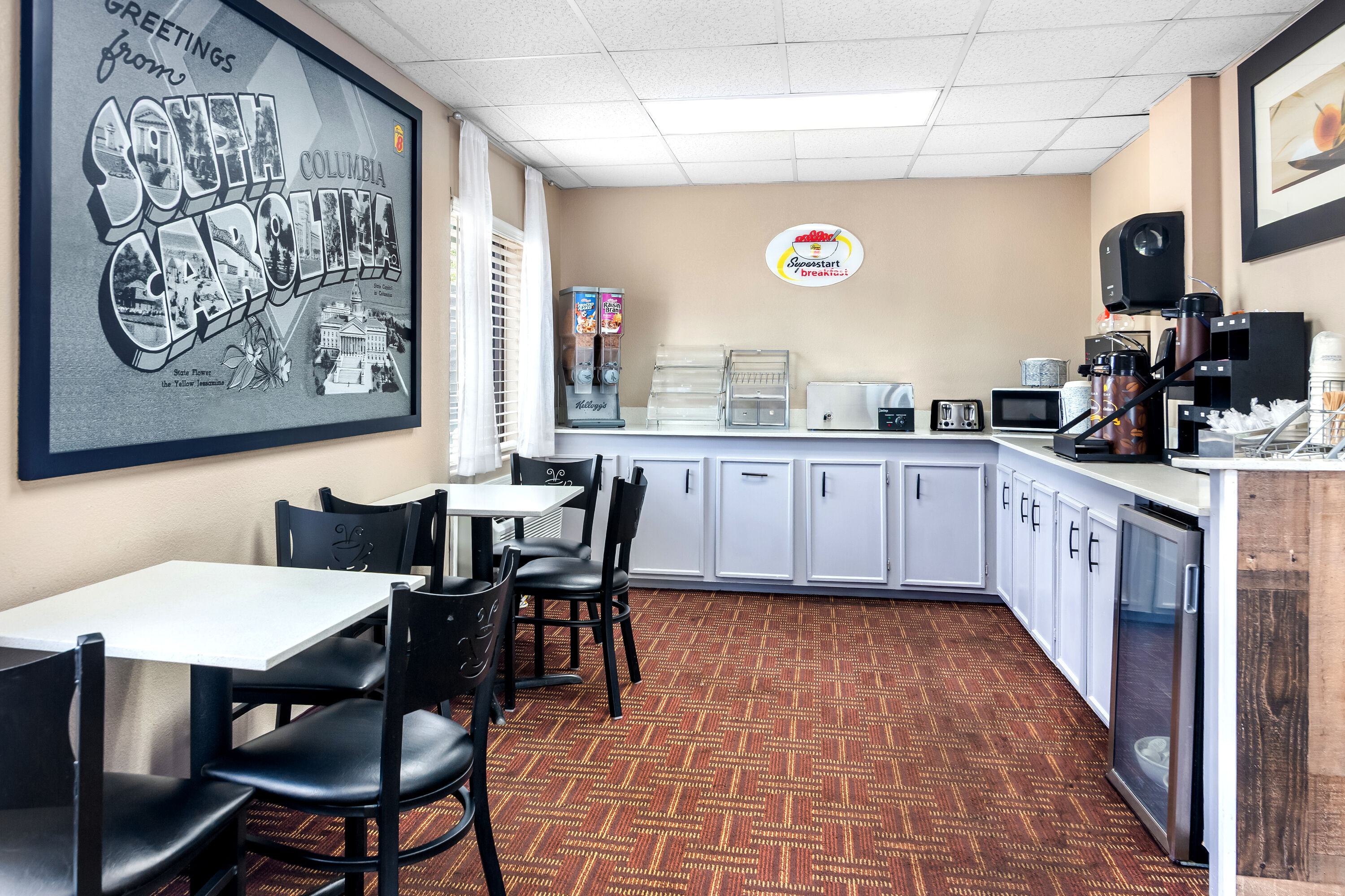 Super 8 by Wyndham Columbia restaurant breakfast area with seating in Columbia, South Carolina