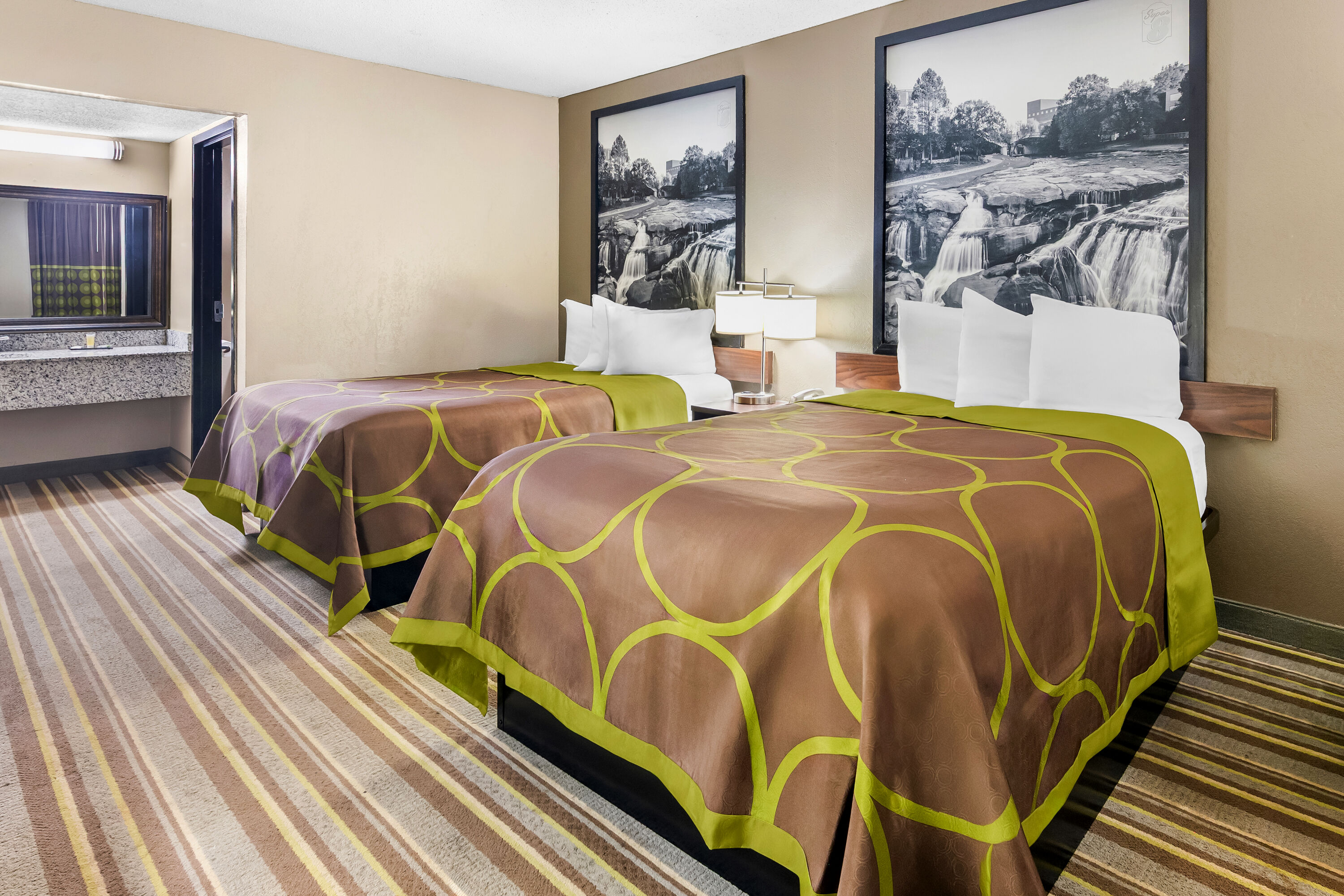 Double bed guest room at the Super 8 by Wyndham Columbia in Columbia, South Carolina