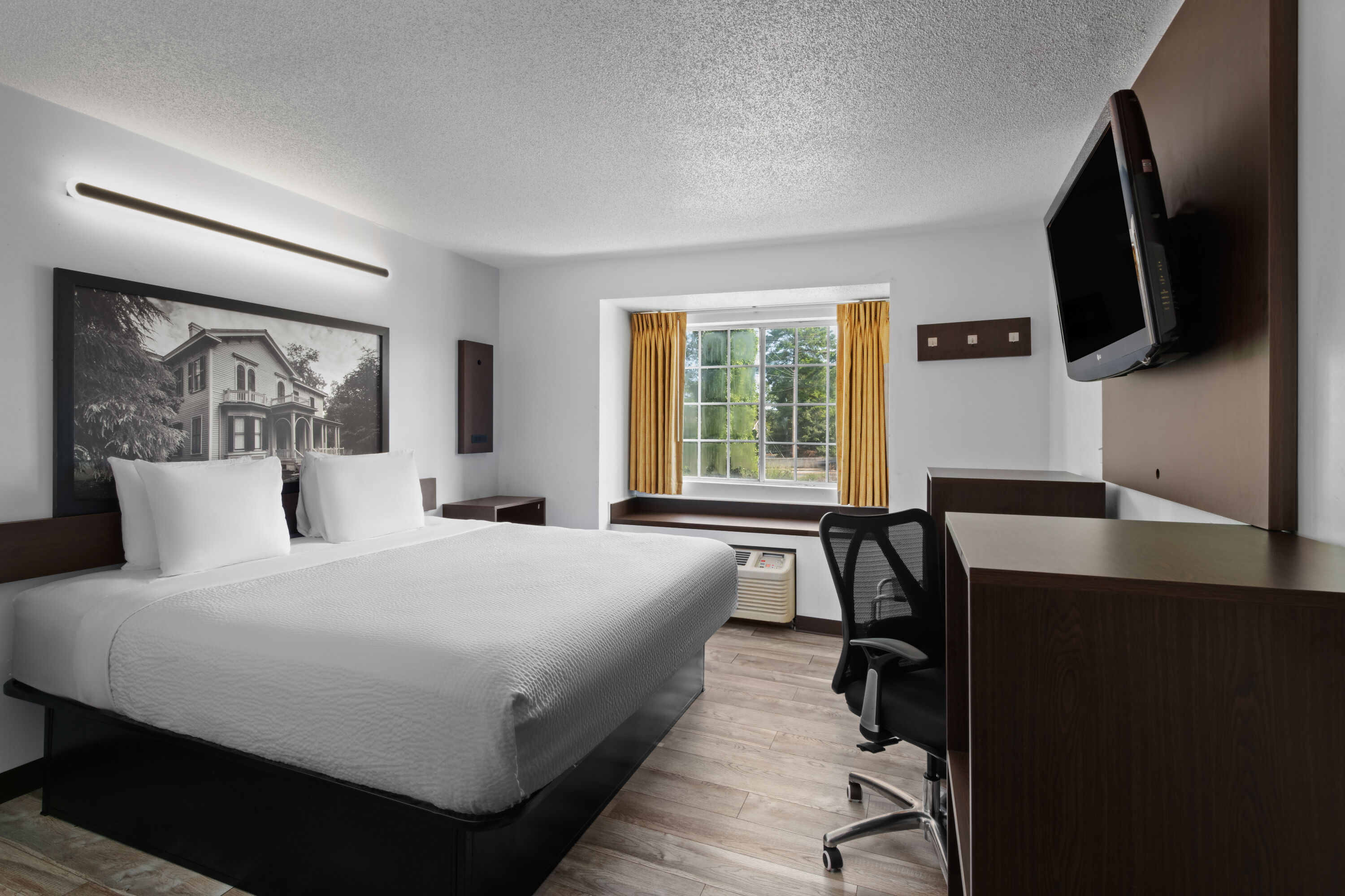 Guest room at the Super 8 by Wyndham Harbison/Parkridge Hospital in Columbia, South Carolina