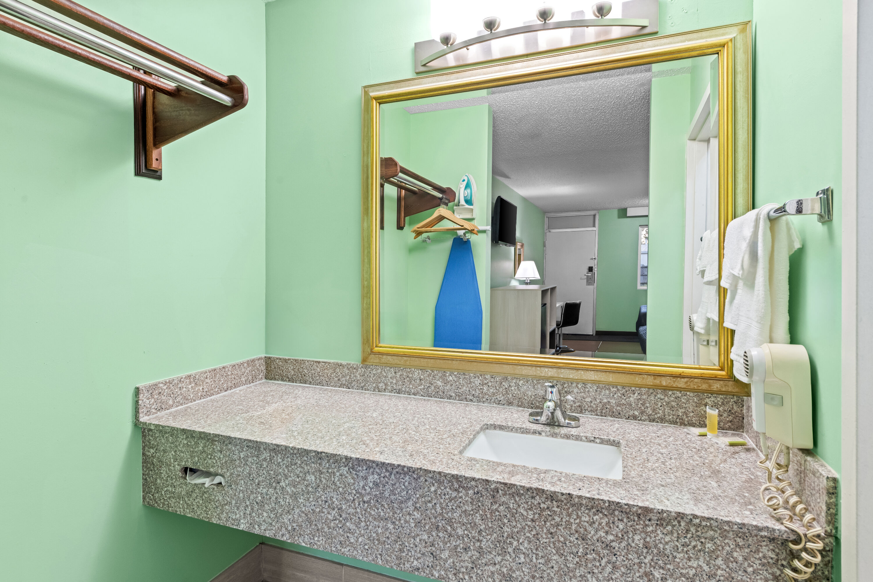 Guest room bath at the Super 8 by Wyndham Gaffney in Gaffney, South Carolina