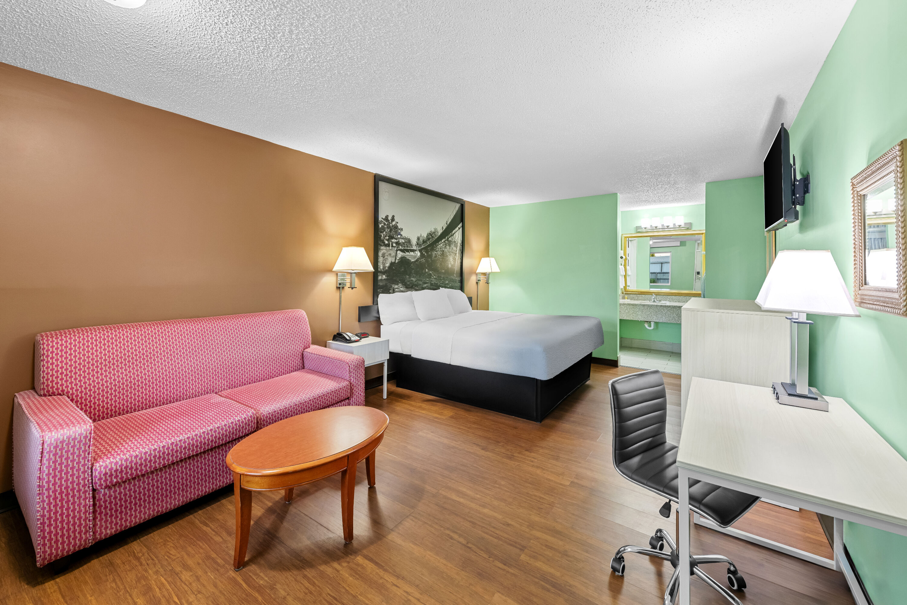 King bed guest room at the Super 8 by Wyndham Gaffney in Gaffney, South Carolina