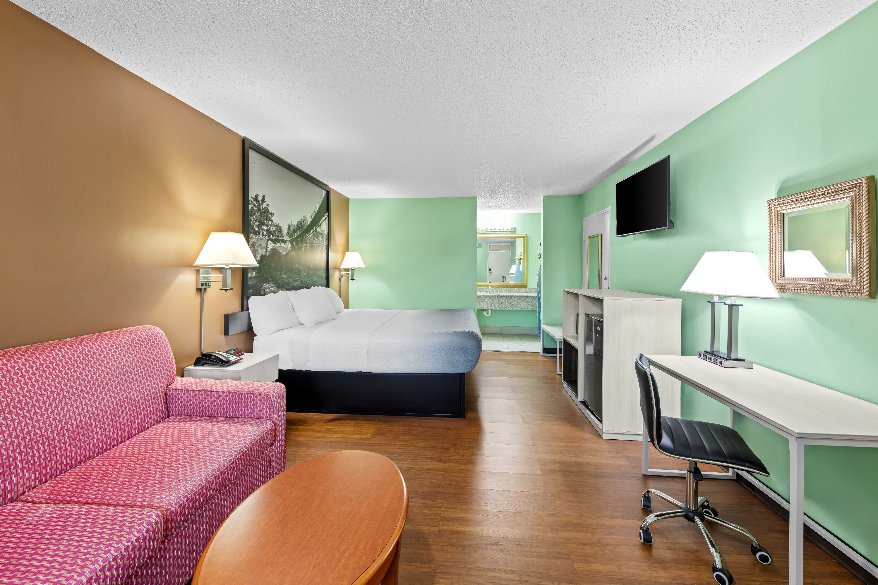 King bed guest room at the Super 8 by Wyndham Gaffney in Gaffney, South Carolina