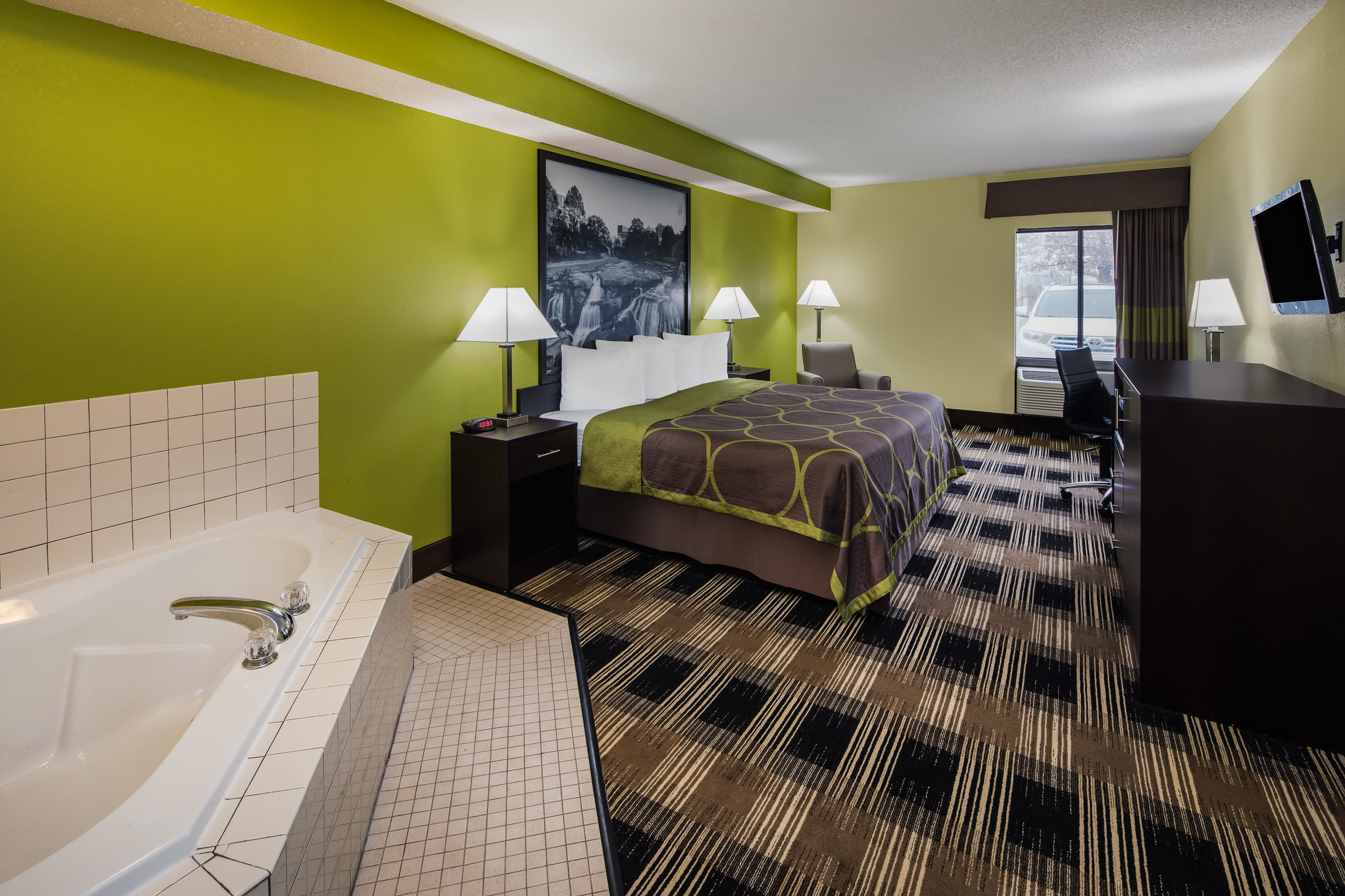 Guest room at the Super 8 by Wyndham Greer/Spartanburg Area in Greer, South Carolina