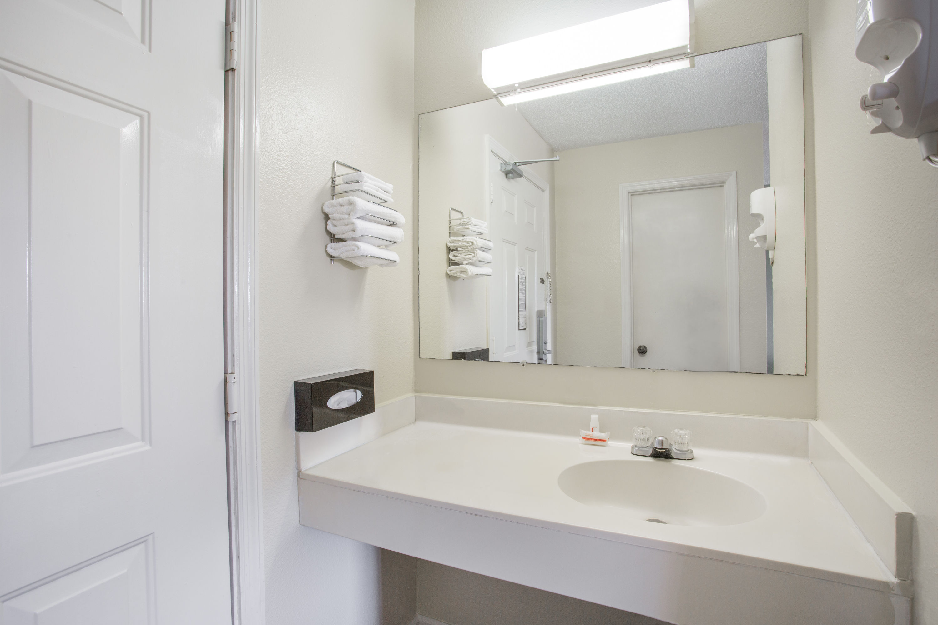 Guest room bath at the Super 8 by Wyndham Manning in Manning, South Carolina