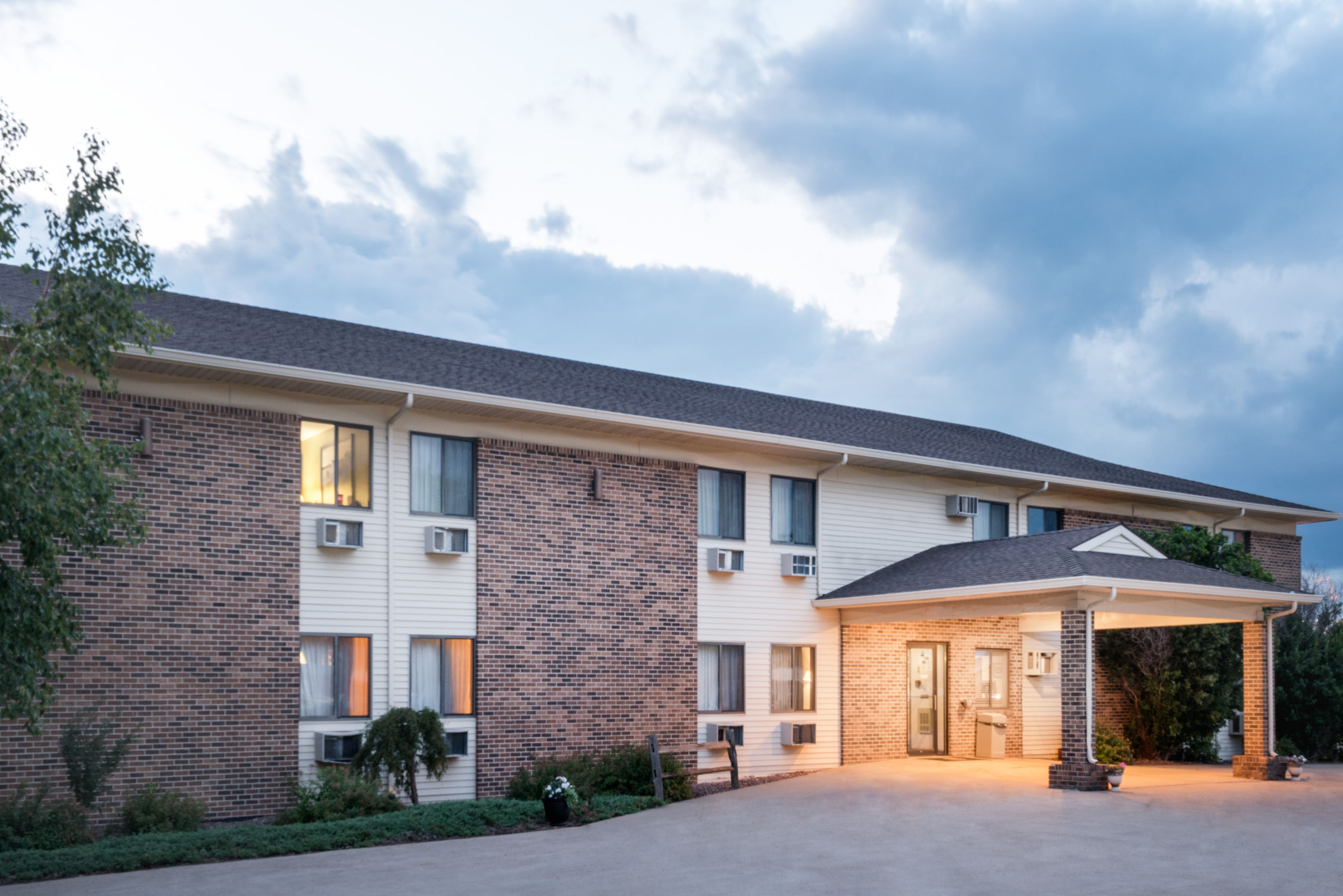 Exterior Dusk Image of Super 8 by Wyndham Milbank SD hotel in Milbank, South Dakota