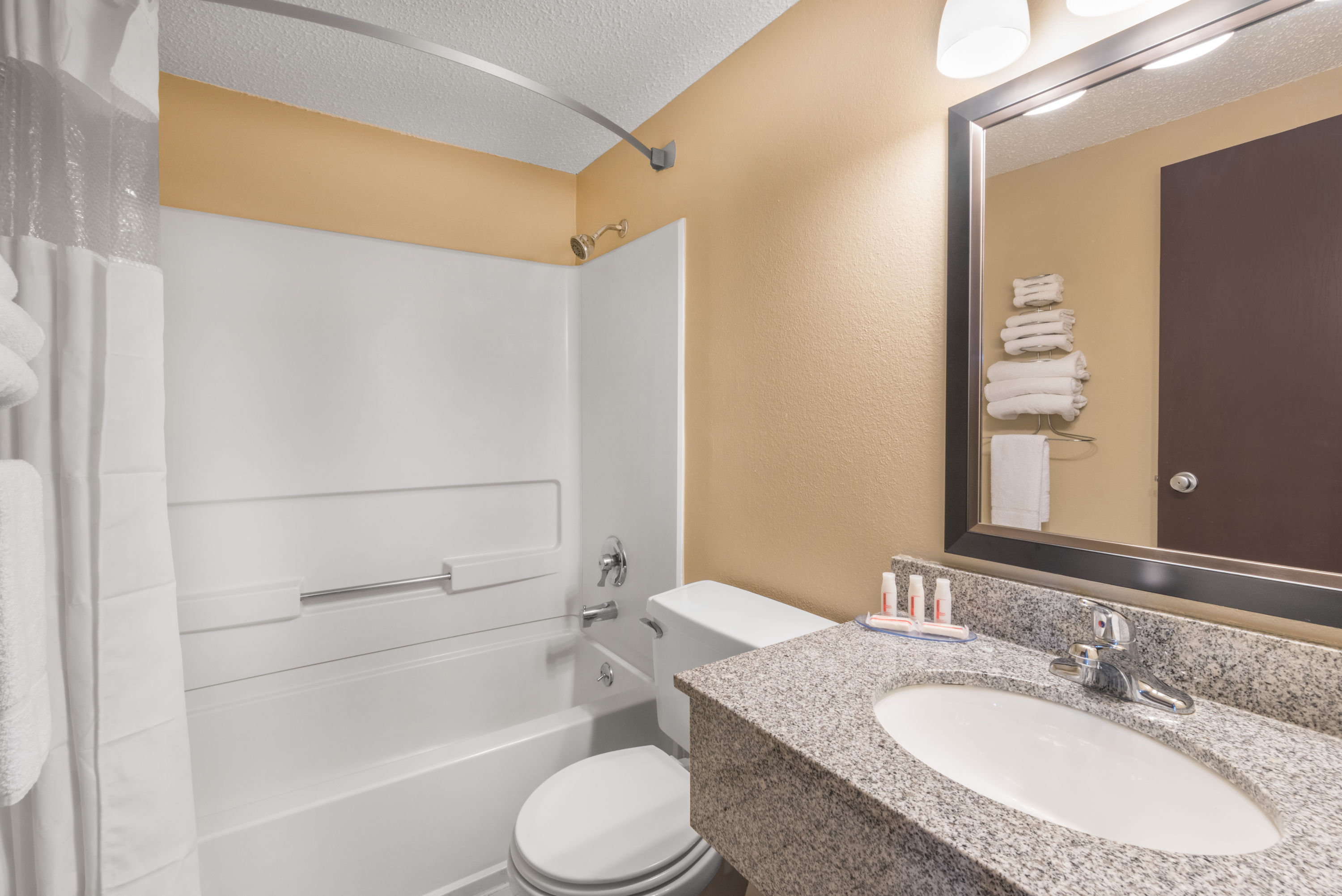 Guest room bath at the Super 8 by Wyndham Pierre SD in Pierre, South Dakota