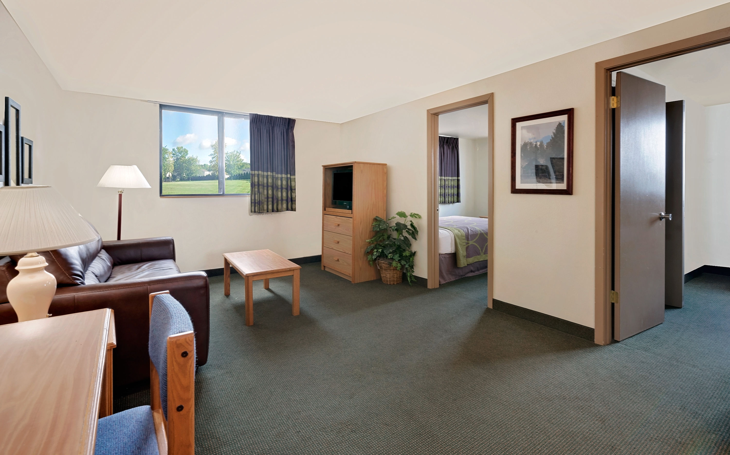 Super 8 by Wyndham Spearfish suite in Spearfish, South Dakota