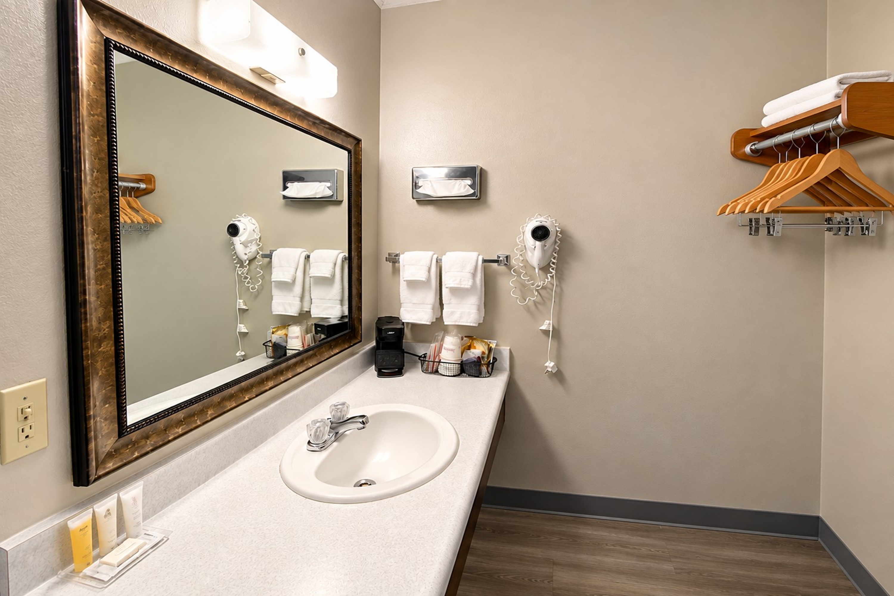 Guest room bath at the Super 8 by Wyndham Sturgis in Sturgis, South Dakota