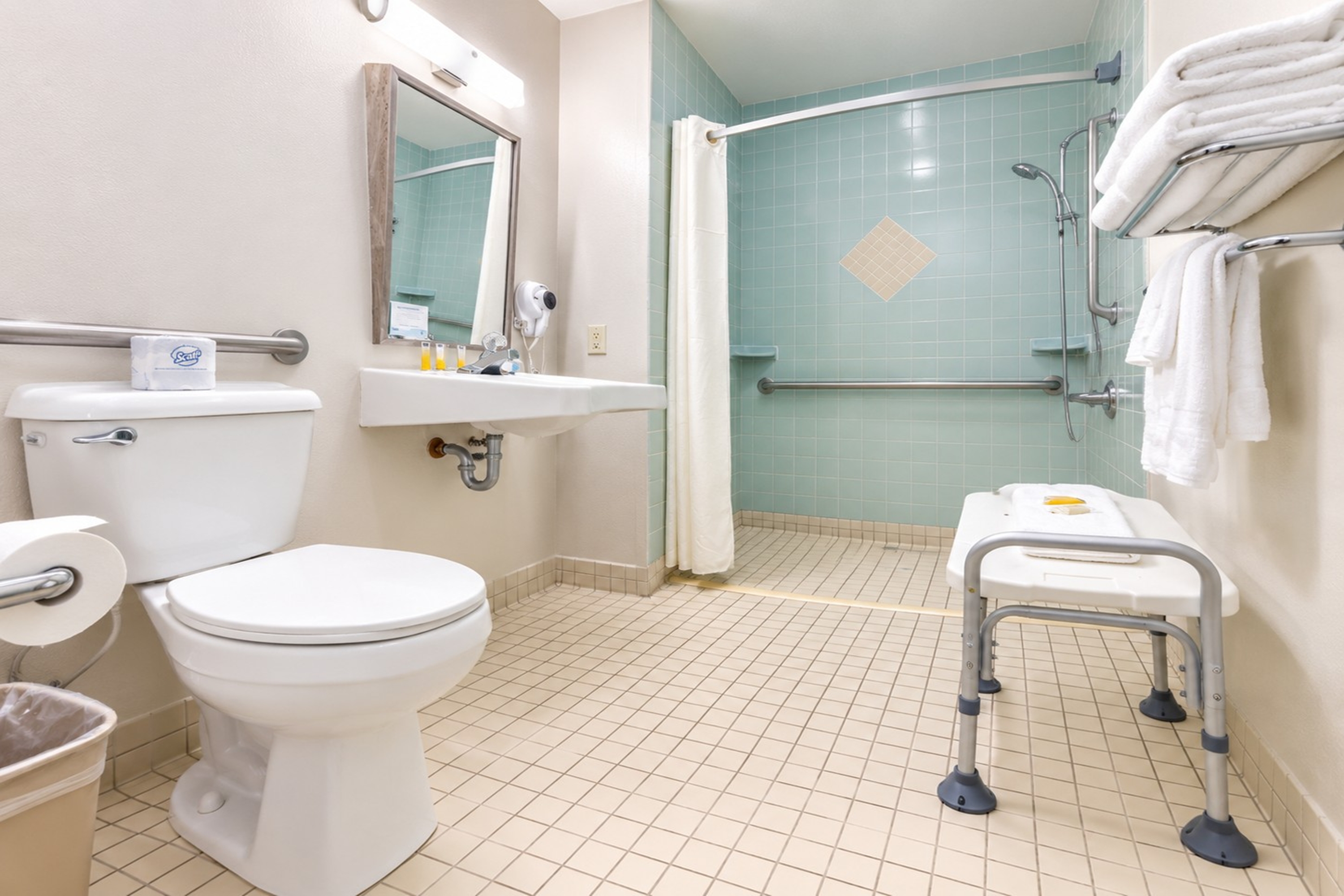 Guest room bath at the Super 8 by Wyndham Sturgis in Sturgis, South Dakota