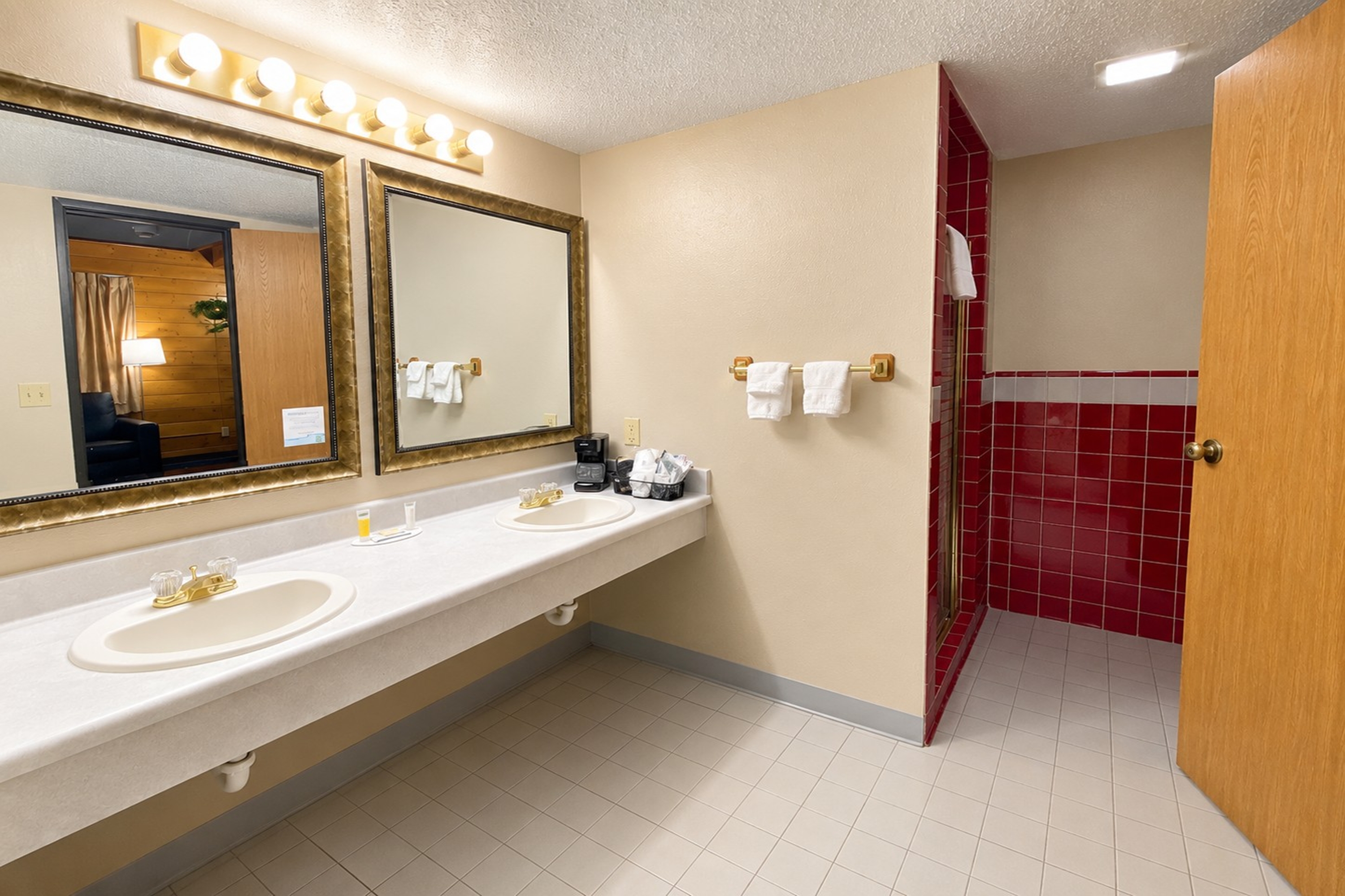 Guest room bath at the Super 8 by Wyndham Sturgis in Sturgis, South Dakota