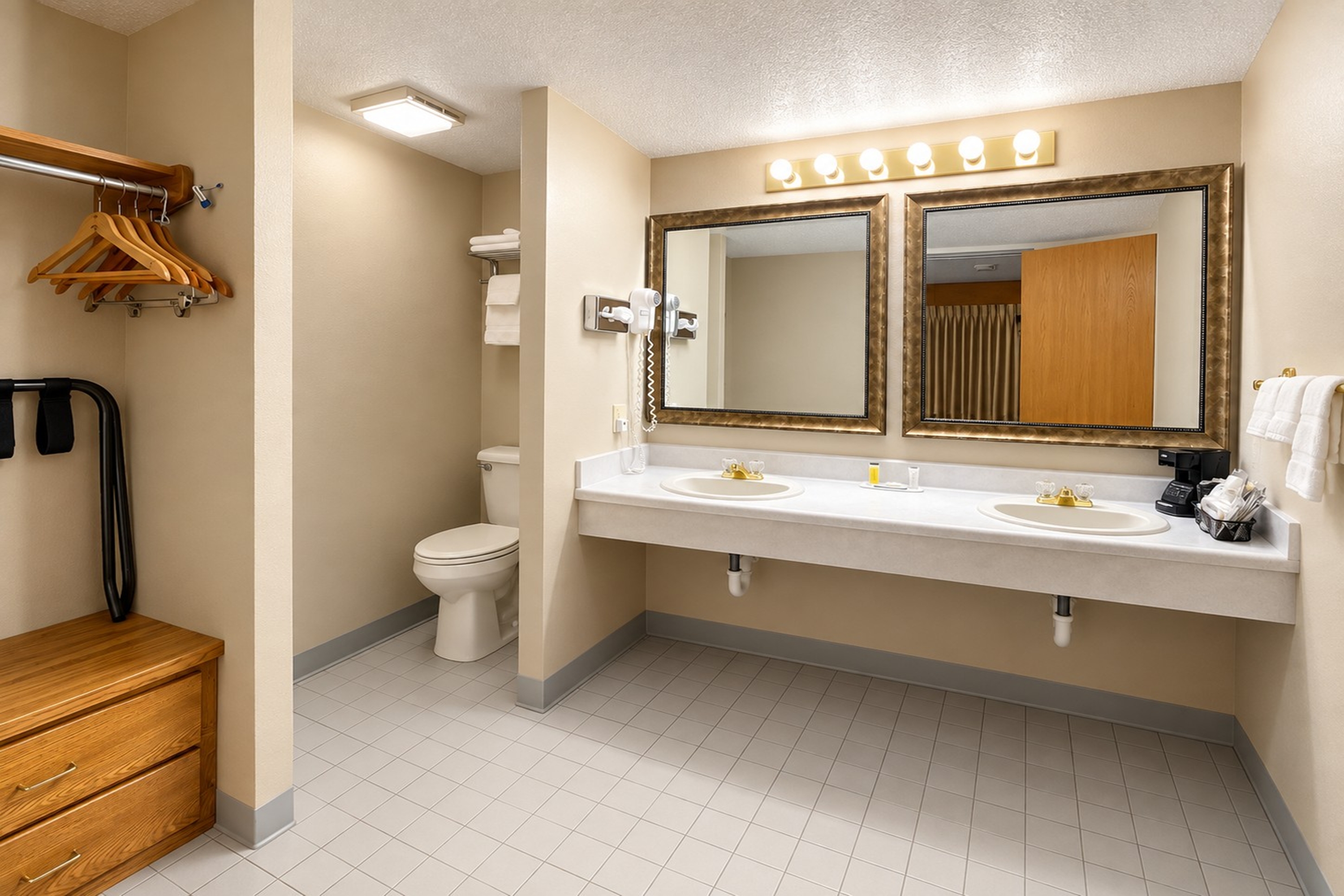 Guest room bath at the Super 8 by Wyndham Sturgis in Sturgis, South Dakota