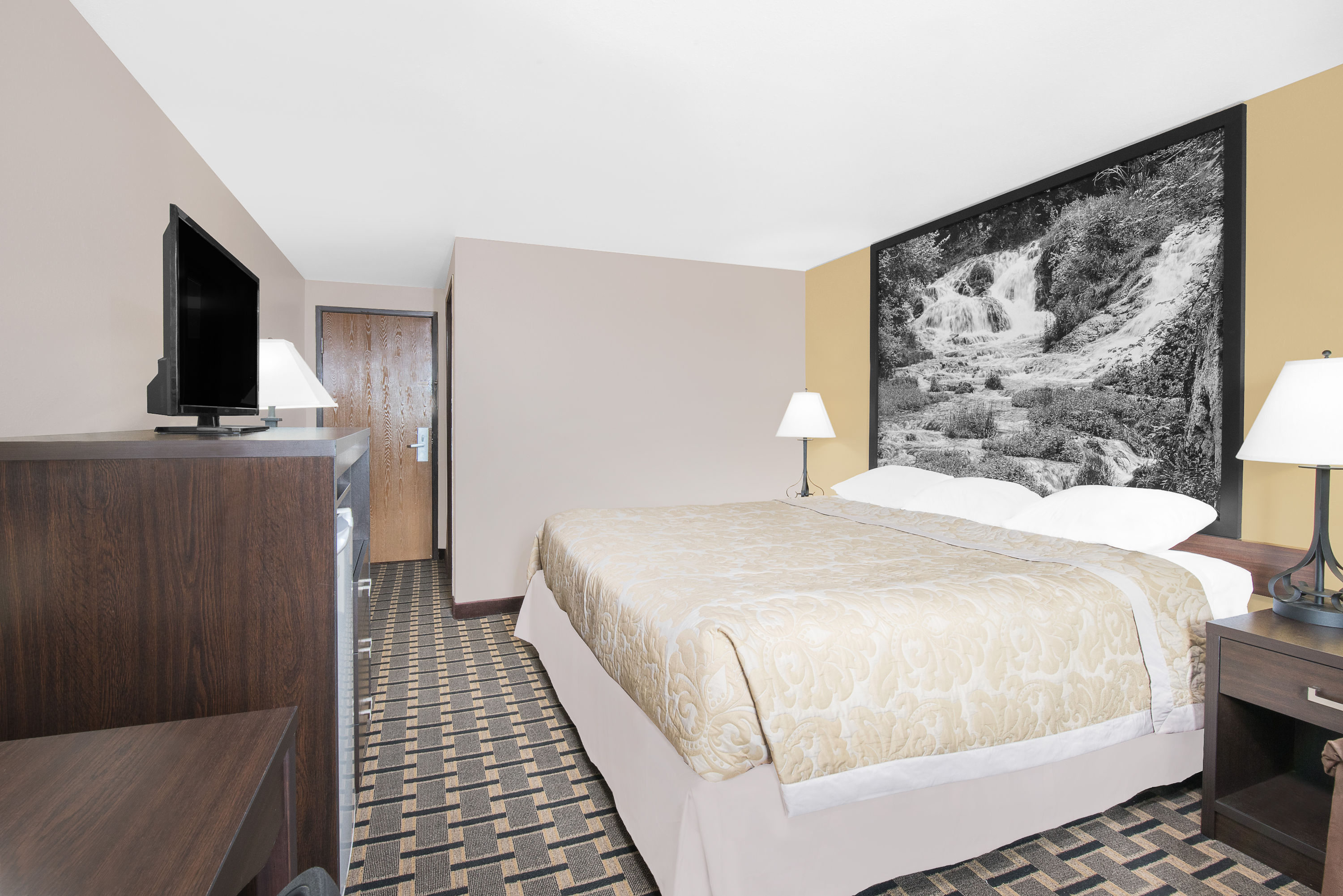 Guest room at the Super 8 by Wyndham Watertown in Watertown, South Dakota