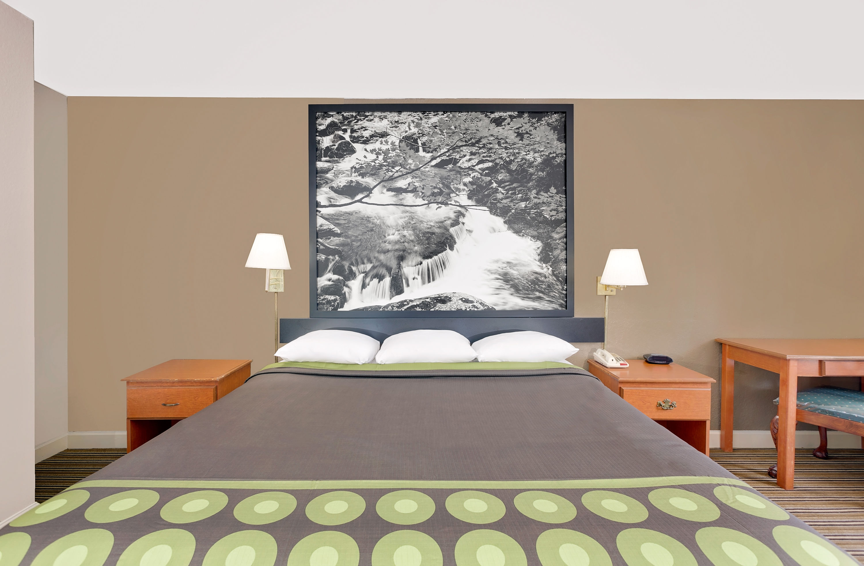 Guest room at the Super 8 by Wyndham Athens in Athens, Tennessee