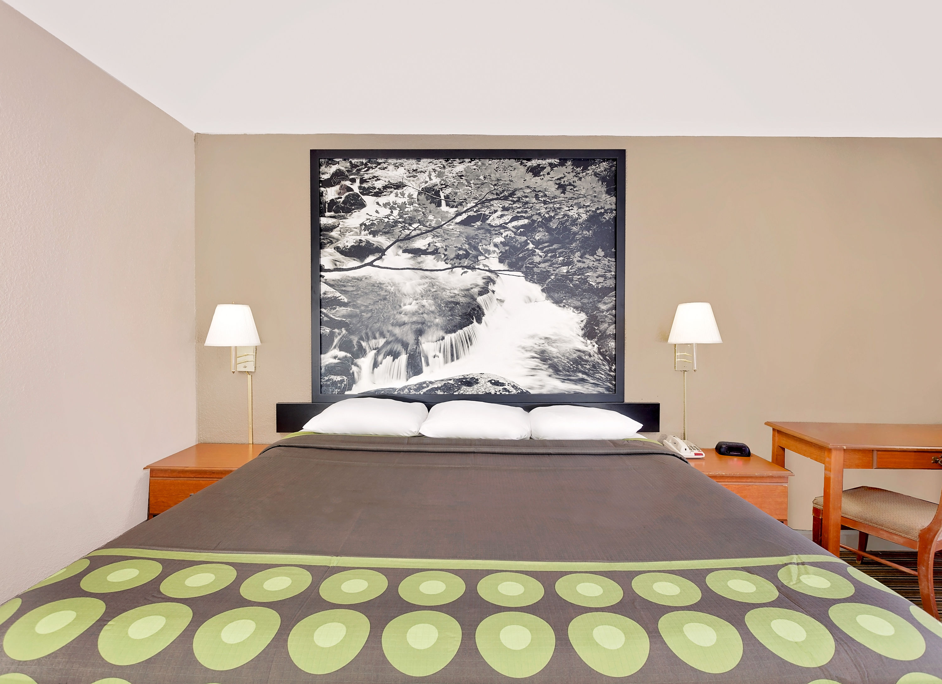 Guest room at the Super 8 by Wyndham Athens in Athens, Tennessee