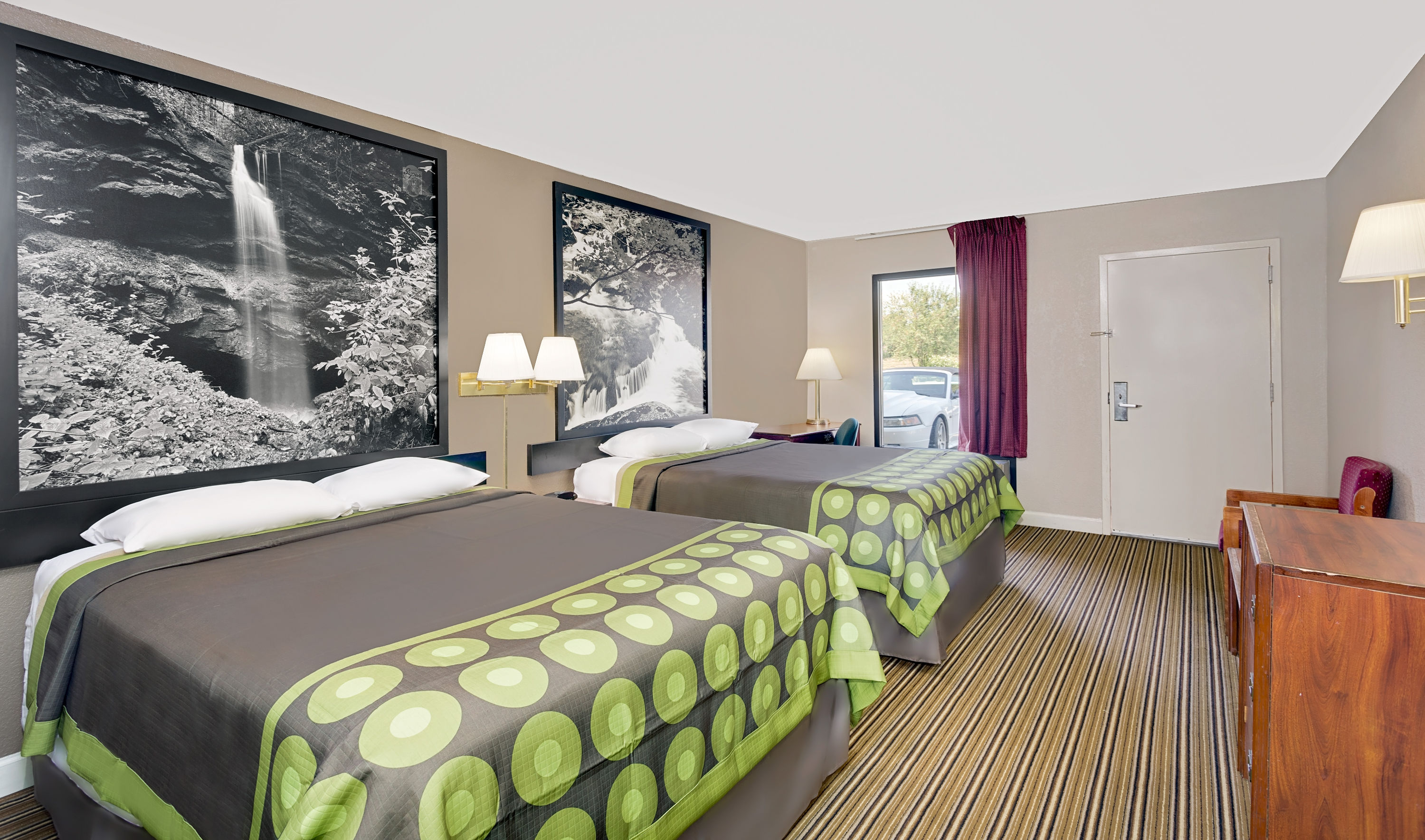 Guest room at the Super 8 by Wyndham Athens in Athens, Tennessee