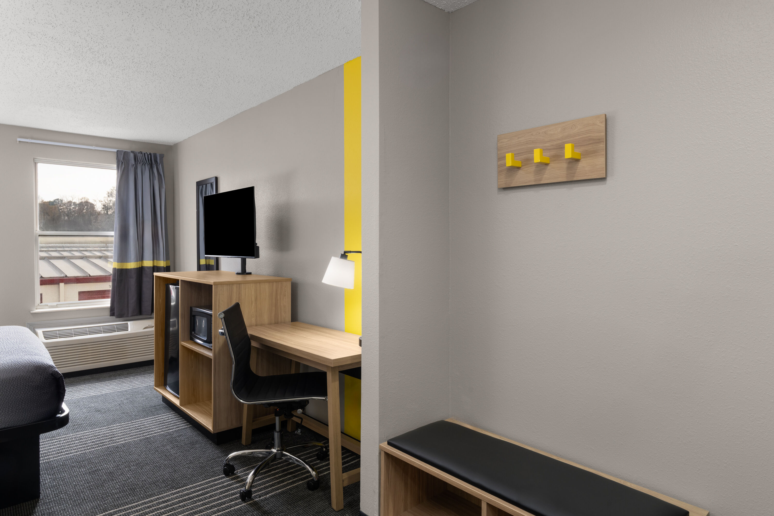 Guest room at the Super 8 by Wyndham Chattanooga East/Hamilton Place in Chattanooga, Tennessee