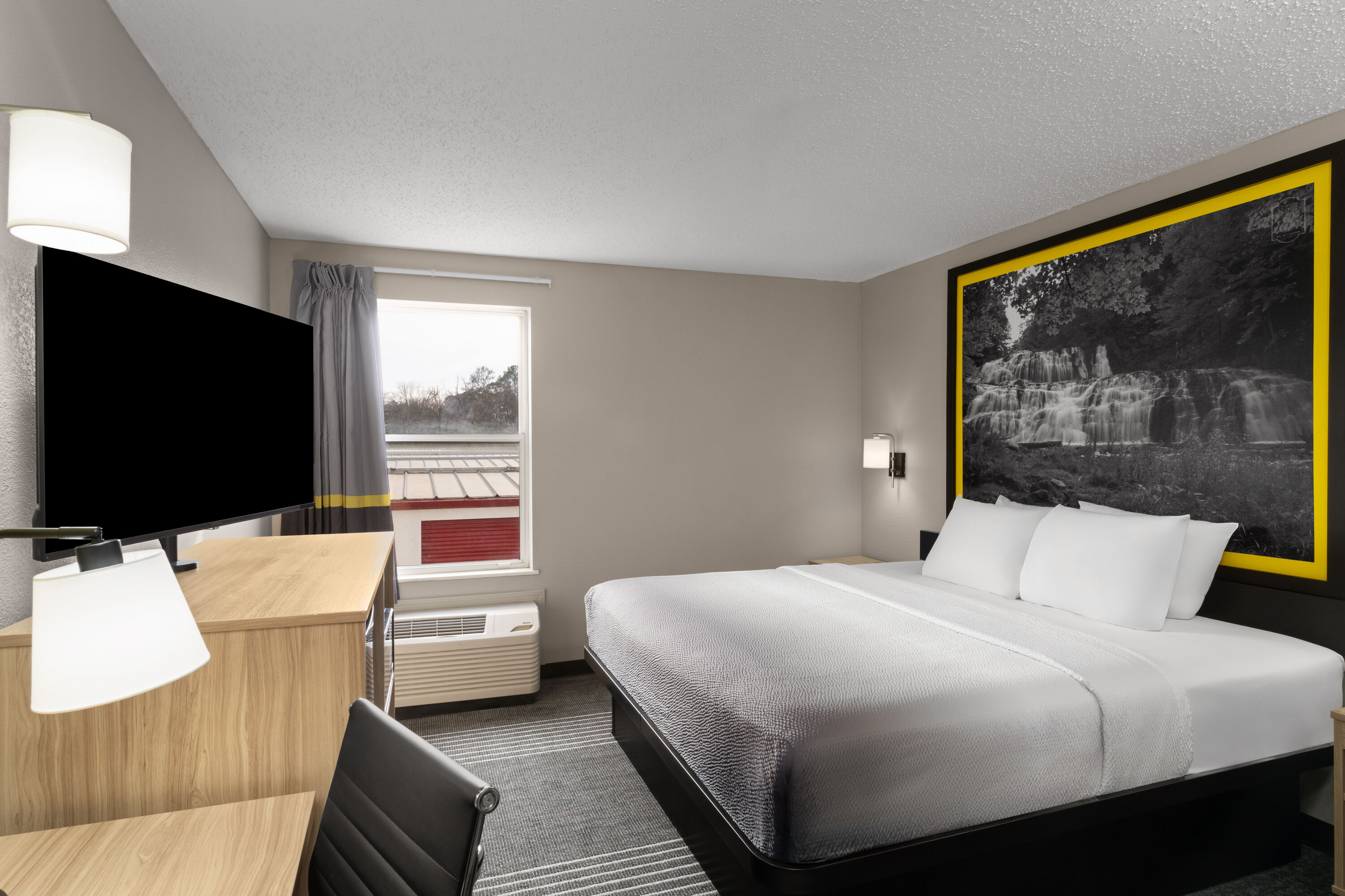 Guest room at the Super 8 by Wyndham Chattanooga East/Hamilton Place in Chattanooga, Tennessee