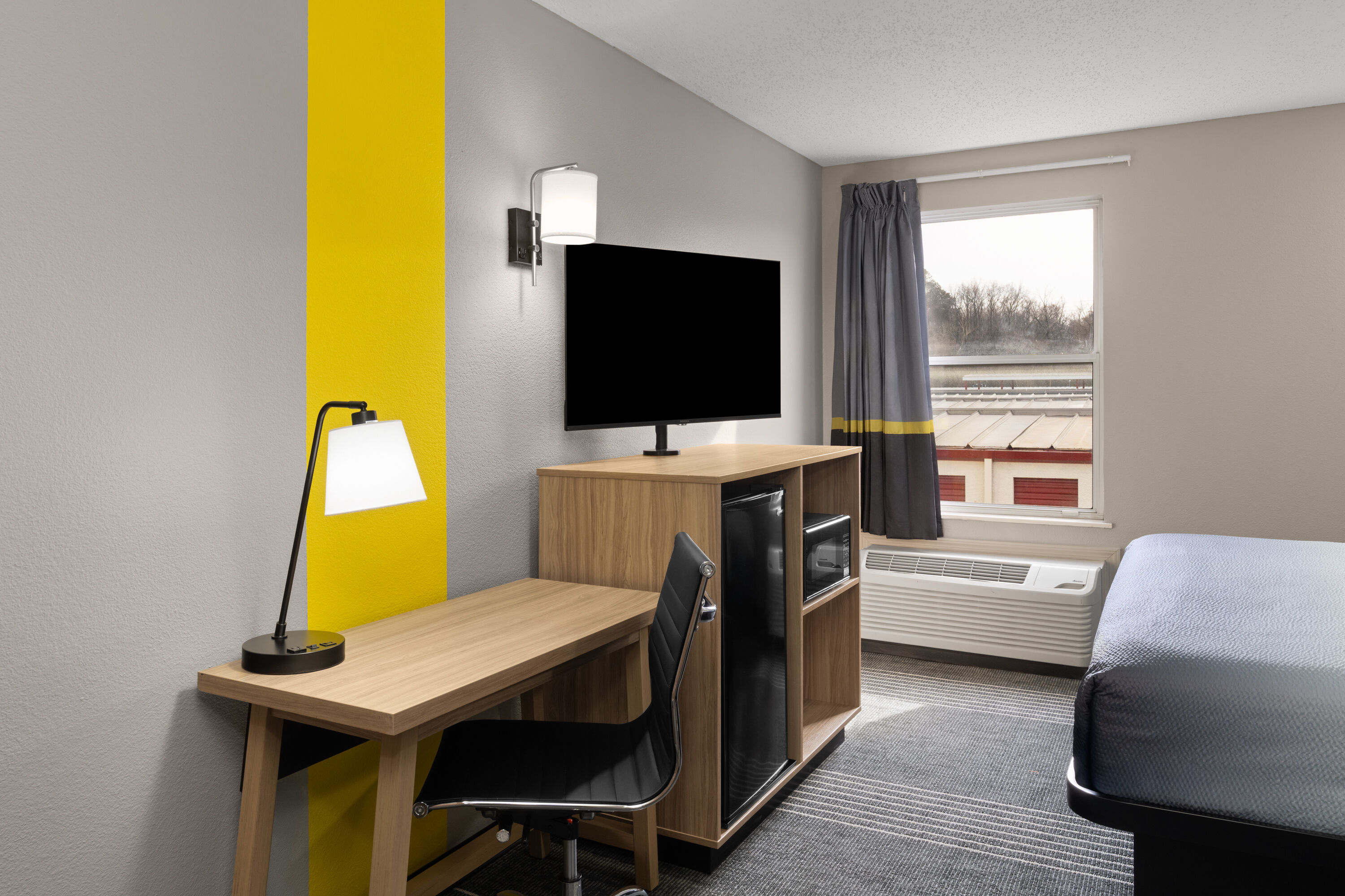 Guest room at the Super 8 by Wyndham Chattanooga East/Hamilton Place in Chattanooga, Tennessee