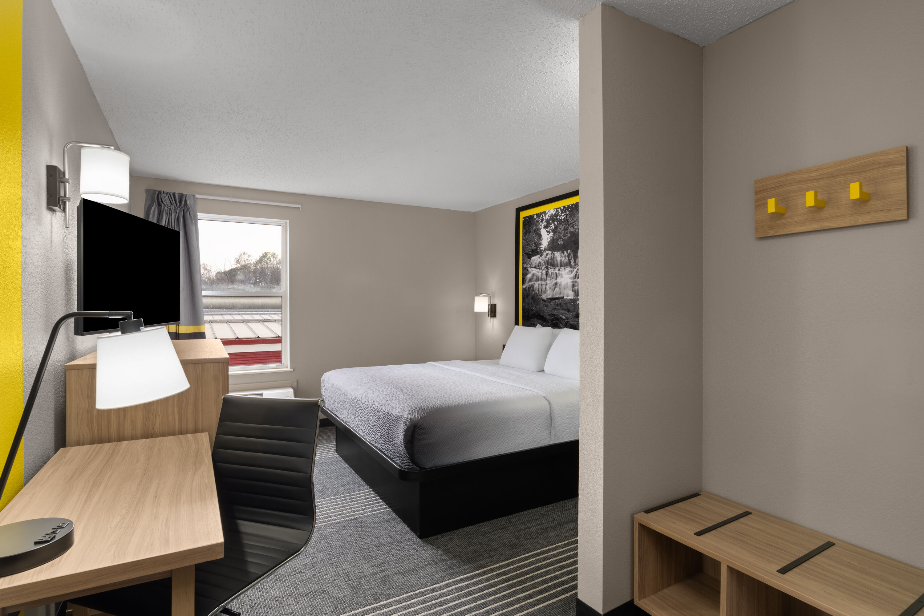 Guest room at the Super 8 by Wyndham Chattanooga East/Hamilton Place in Chattanooga, Tennessee