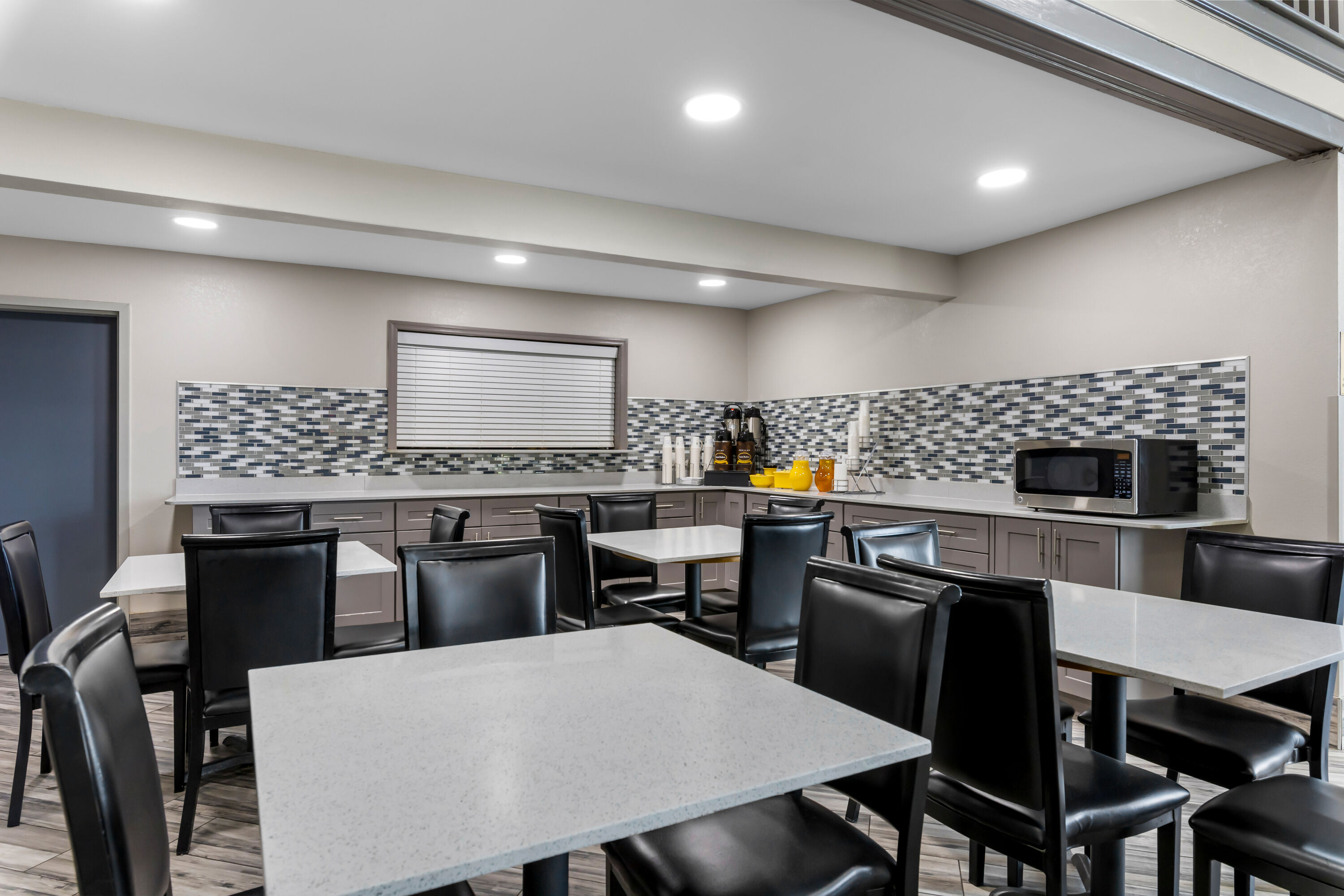 Super 8 by Wyndham Dickson restaurant breakfast area with seating in Dickson, Tennessee