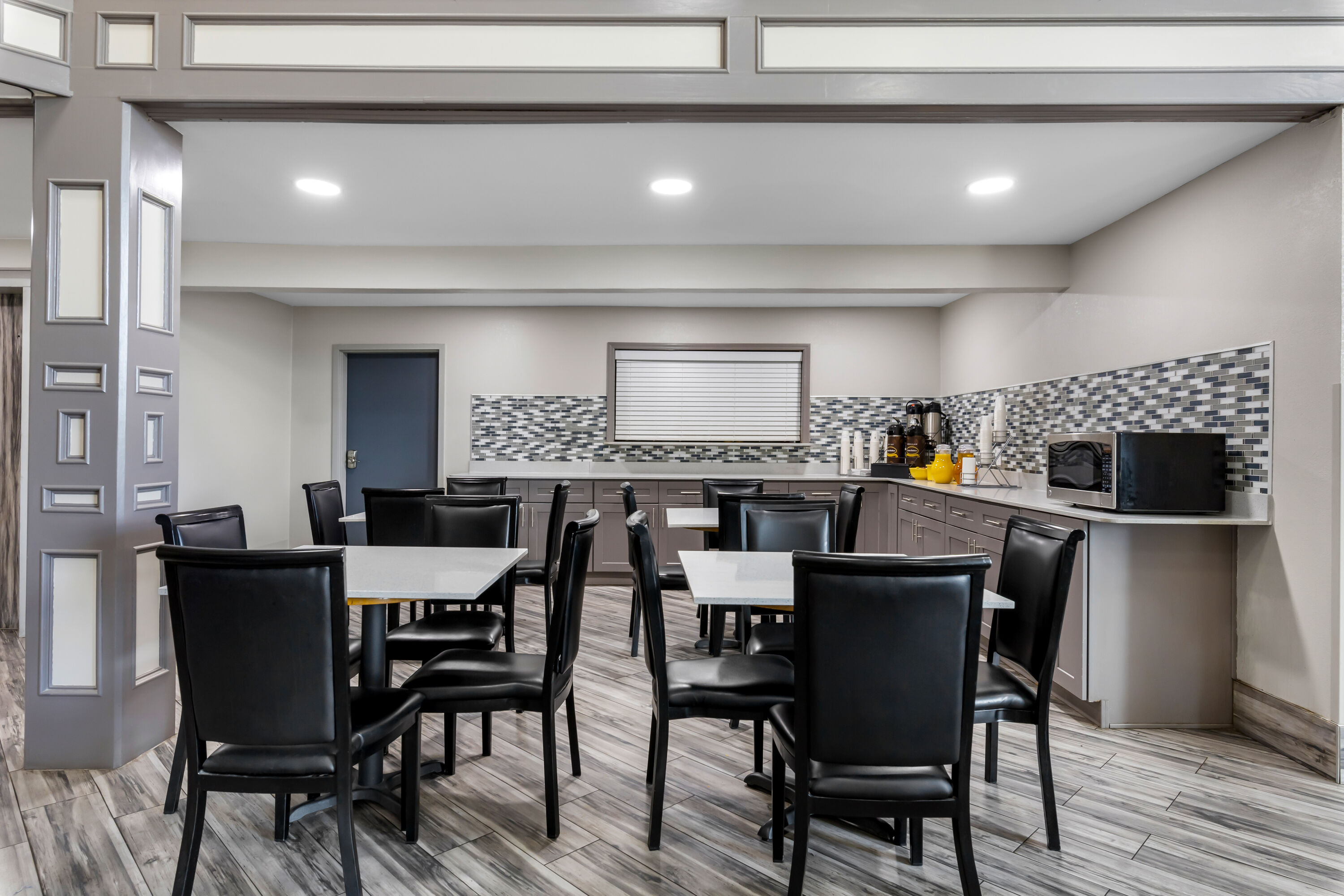 Super 8 by Wyndham Dickson restaurant breakfast area with seating in Dickson, Tennessee