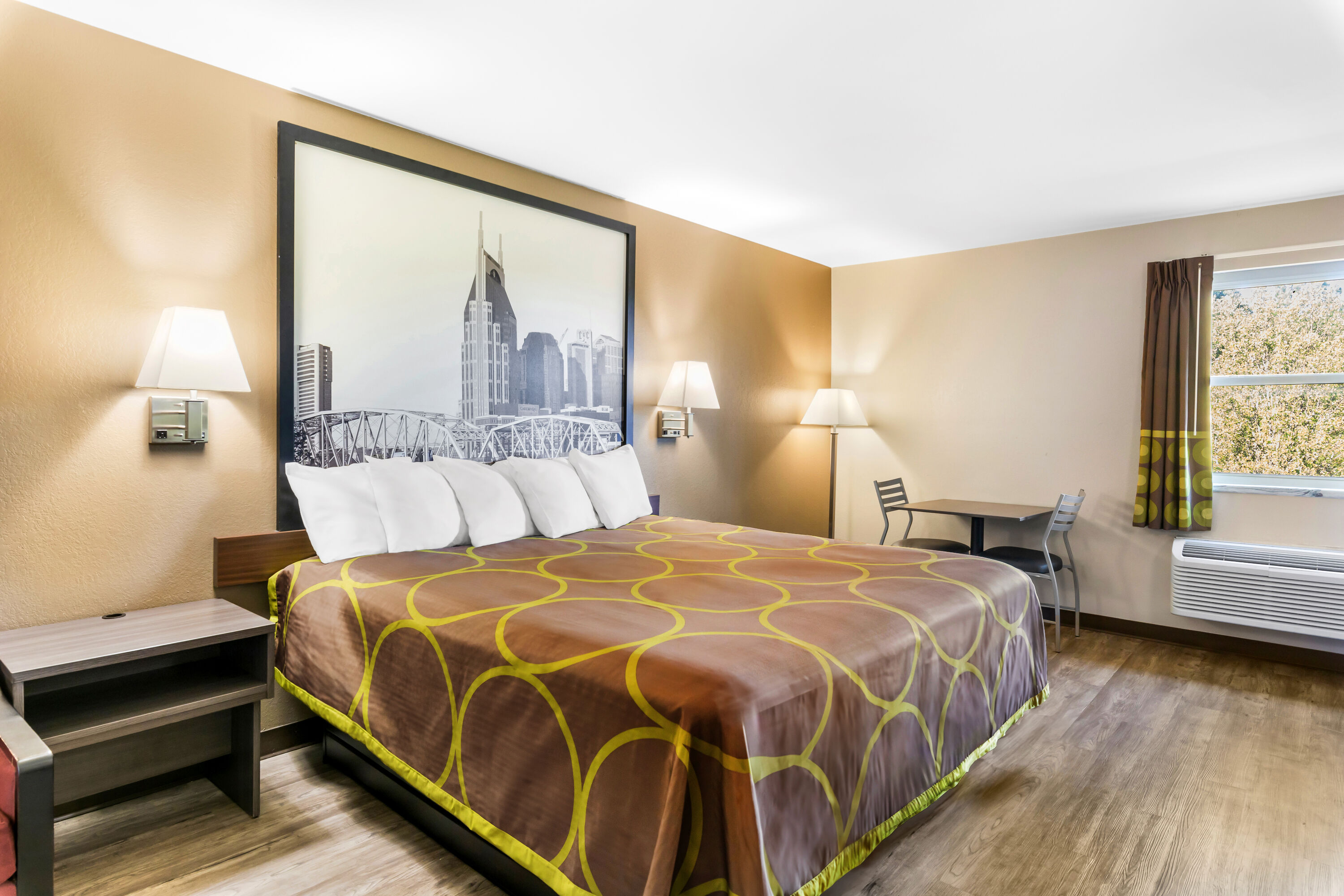 King bed guest room at the Super 8 by Wyndham Dickson in Dickson, Tennessee