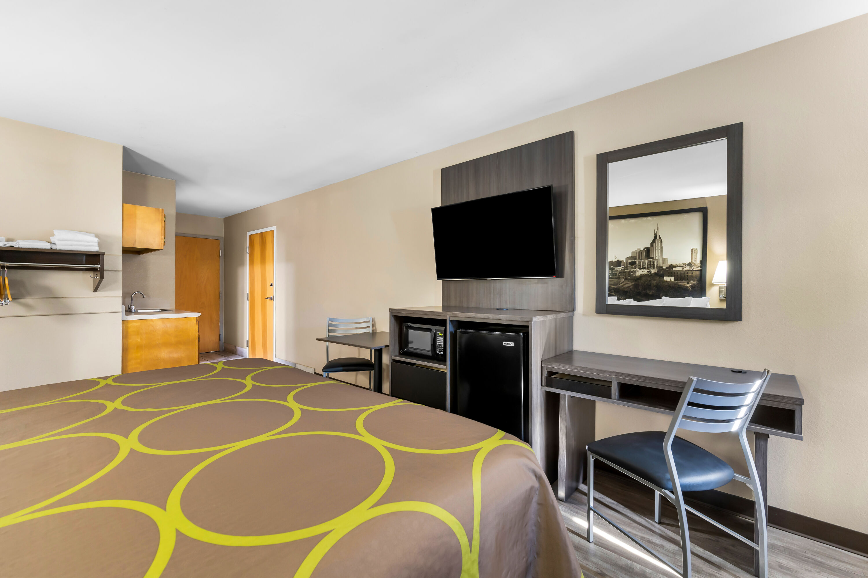 King bed guest room at the Super 8 by Wyndham Dickson in Dickson, Tennessee