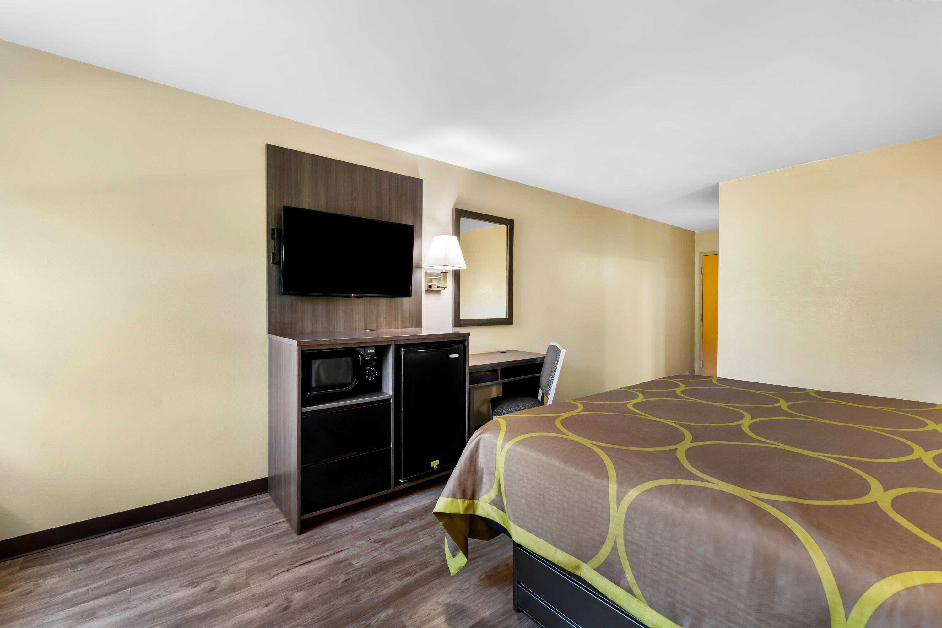 King bed guest room at the Super 8 by Wyndham Dickson in Dickson, Tennessee