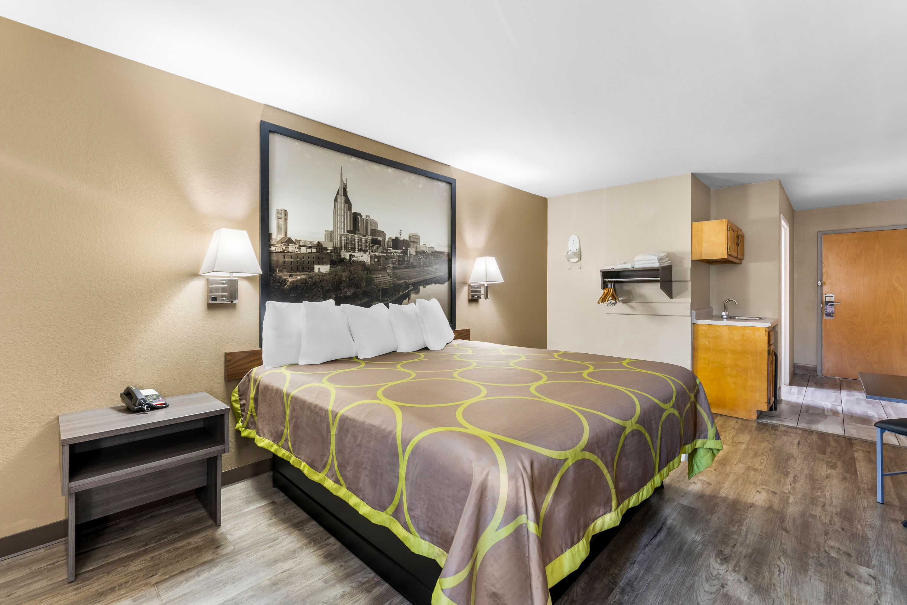 King bed guest room at the Super 8 by Wyndham Dickson in Dickson, Tennessee