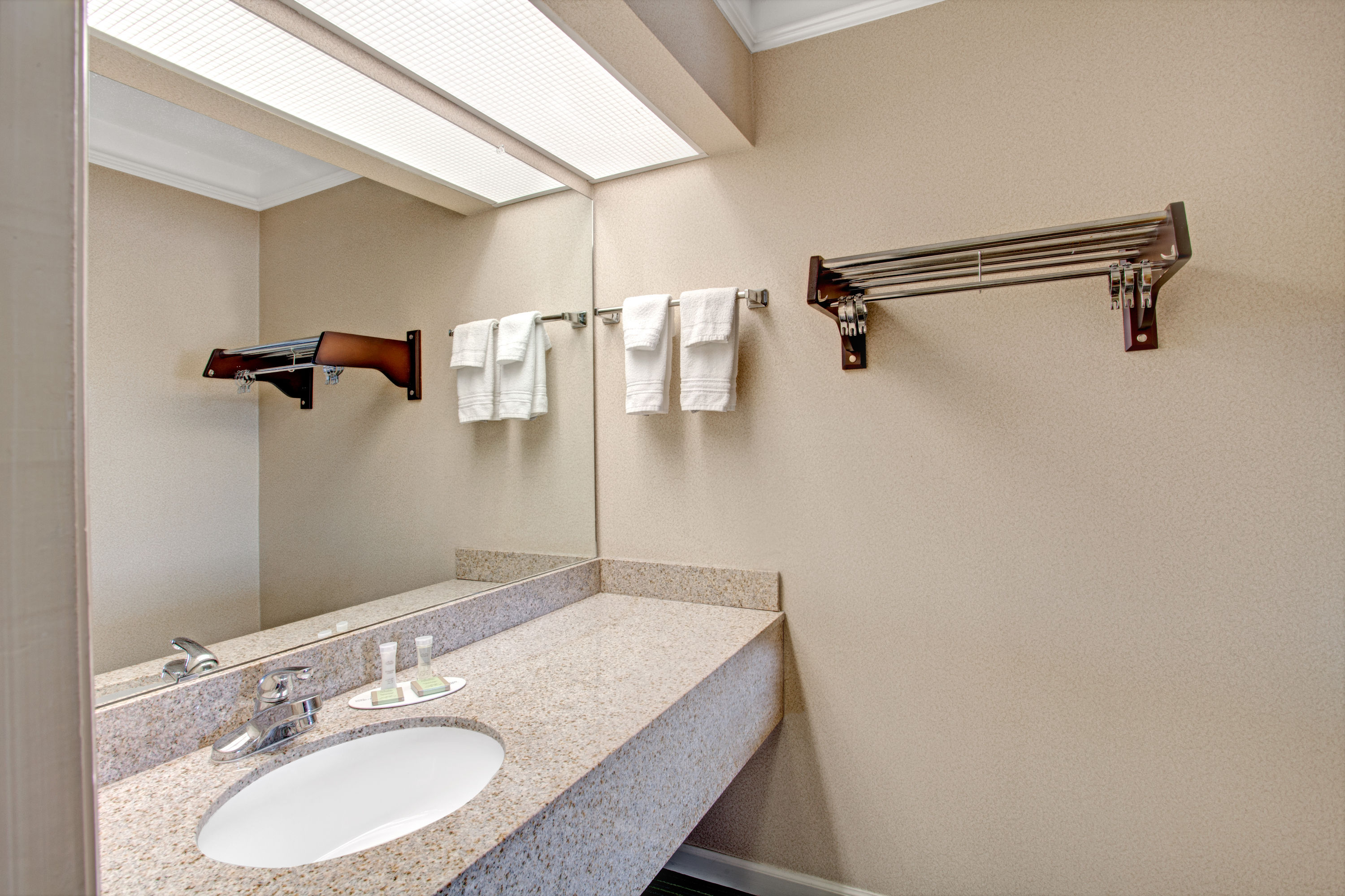 Guest room at the Super 8 by Wyndham Knoxville East in Knoxville, Tennessee