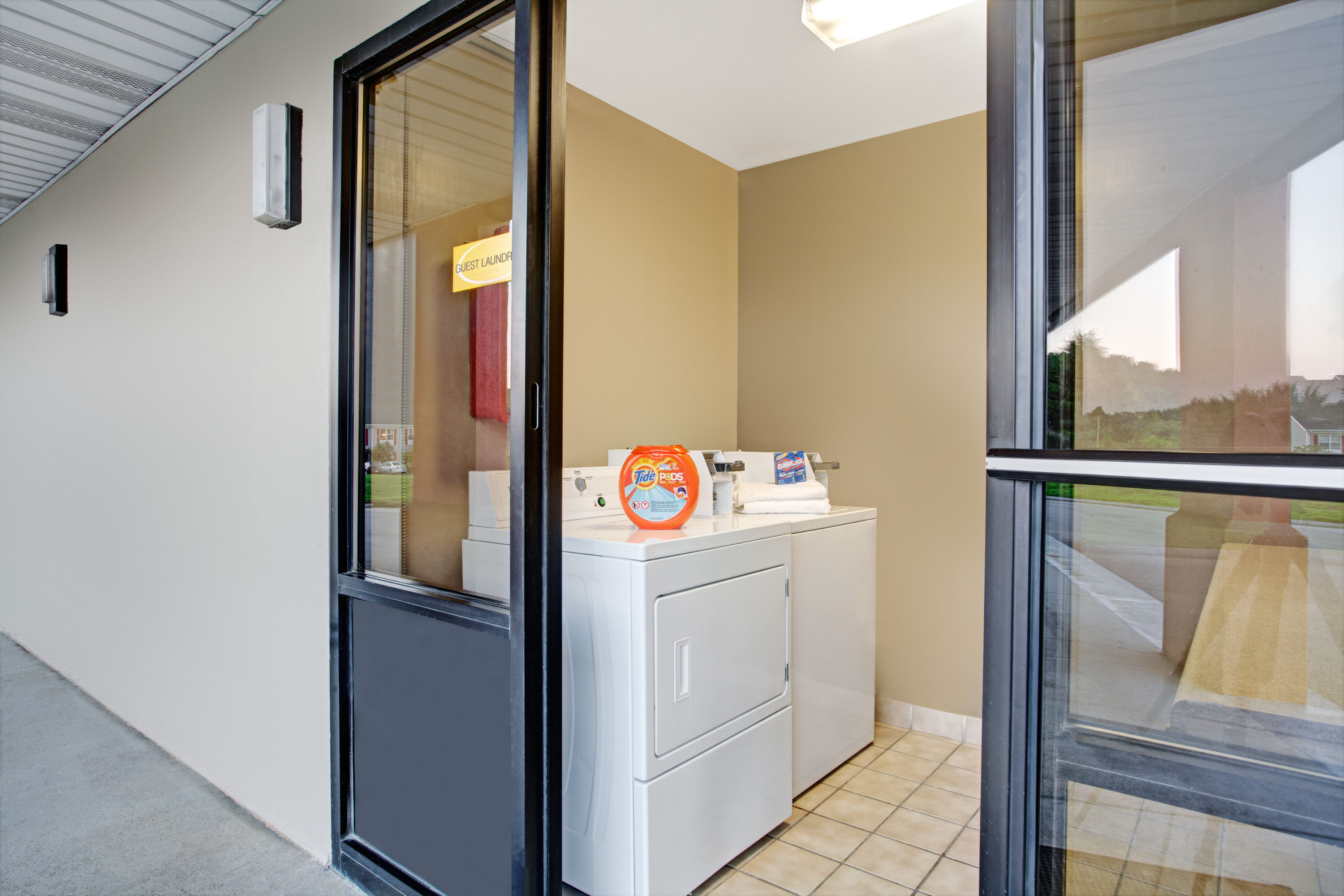 Laundry facilities at Super 8 by Wyndham Knoxville East in Knoxville, Tennessee