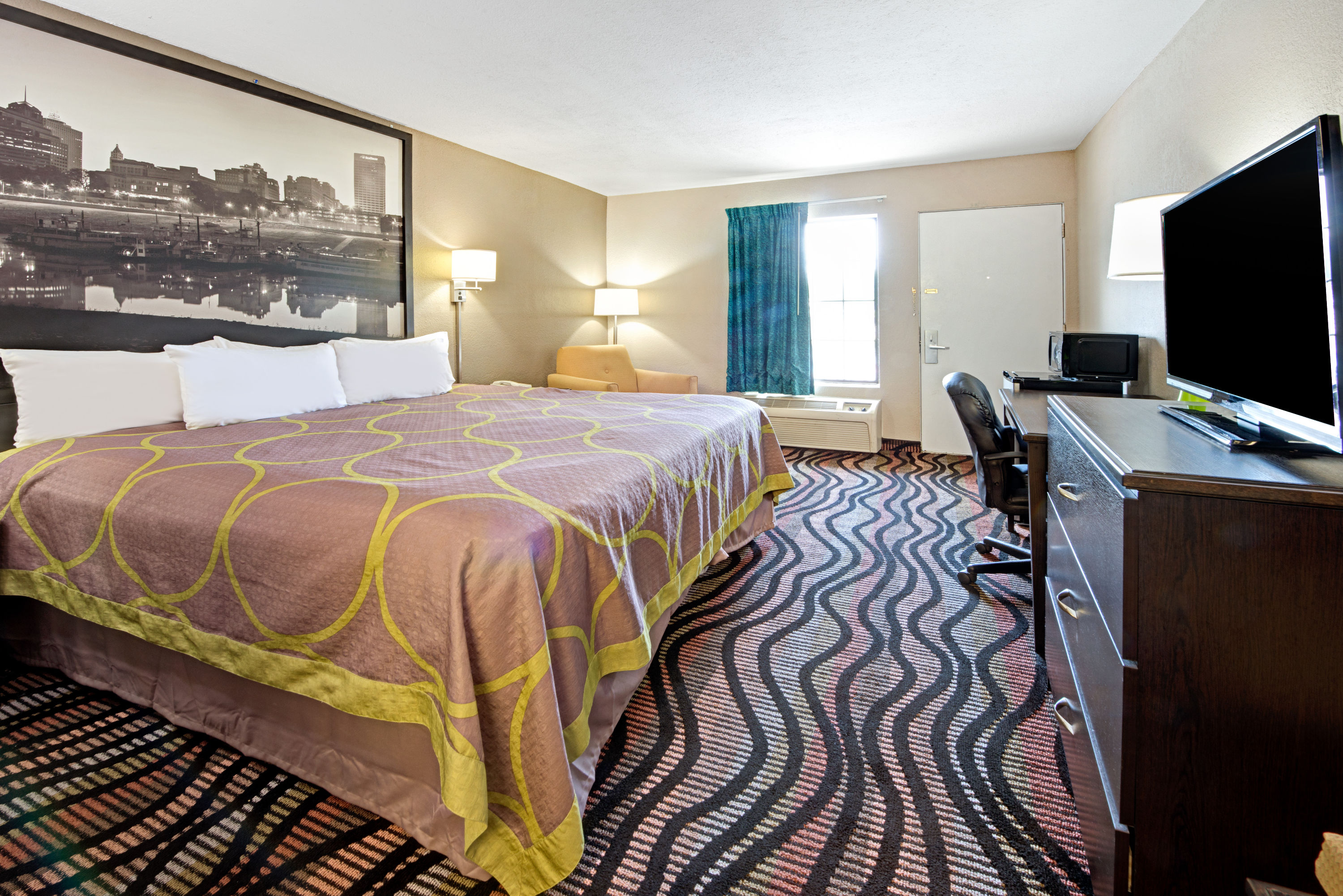 Guest room at the Super 8 by Wyndham Lakeland in Lakeland, Tennessee