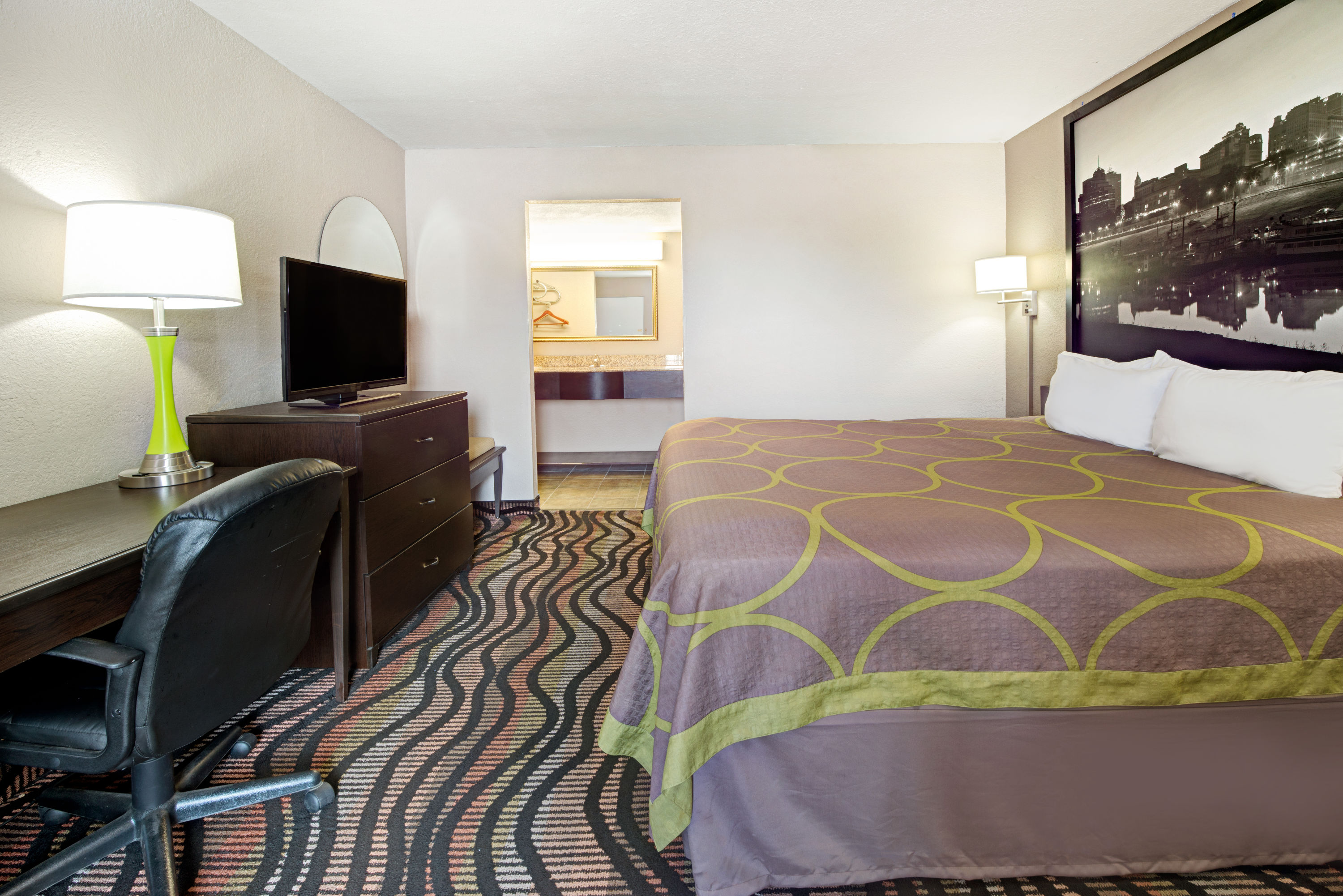 Guest room at the Super 8 by Wyndham Lakeland in Lakeland, Tennessee