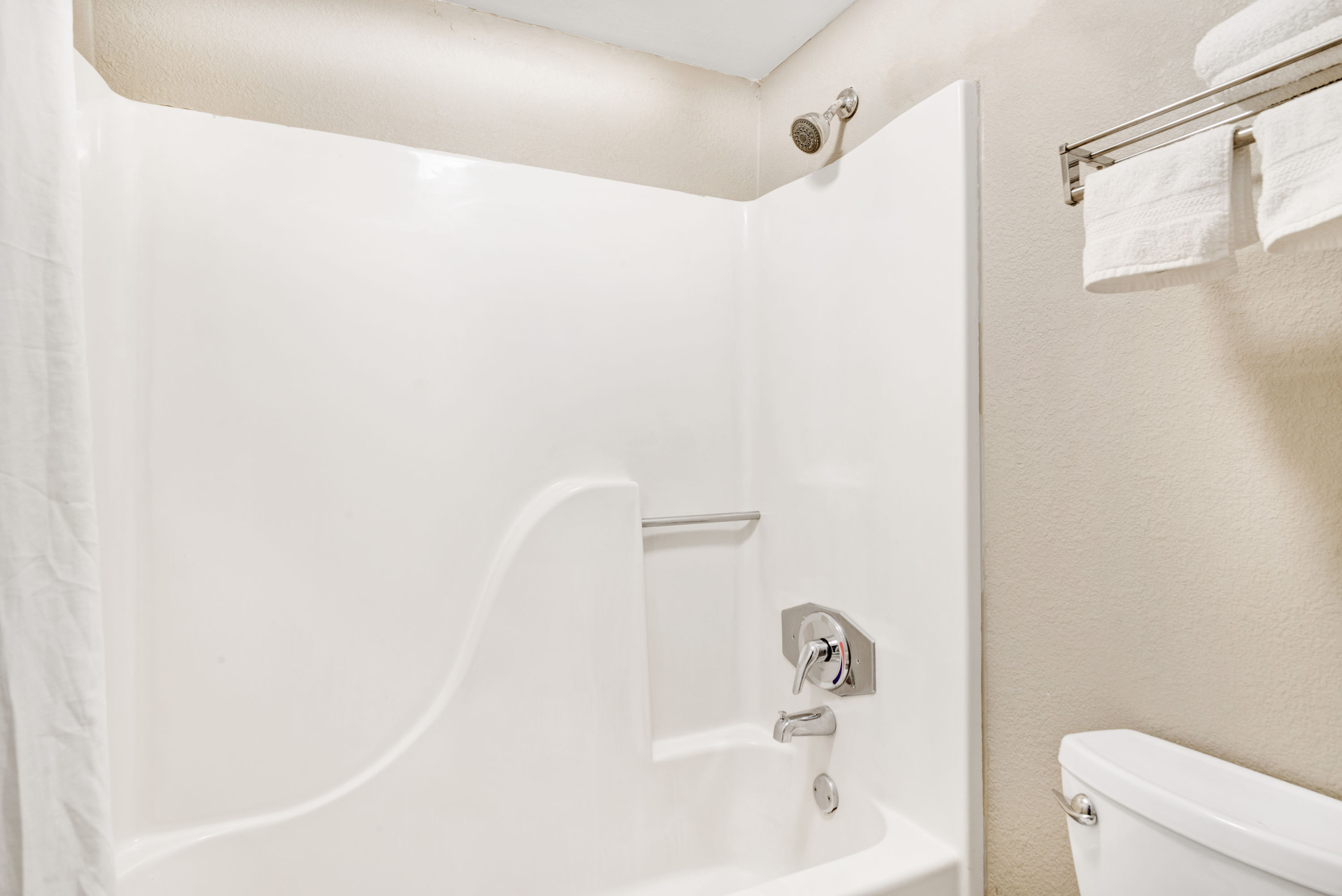 Guest room at the Super 8 by Wyndham Lakeland in Lakeland, Tennessee