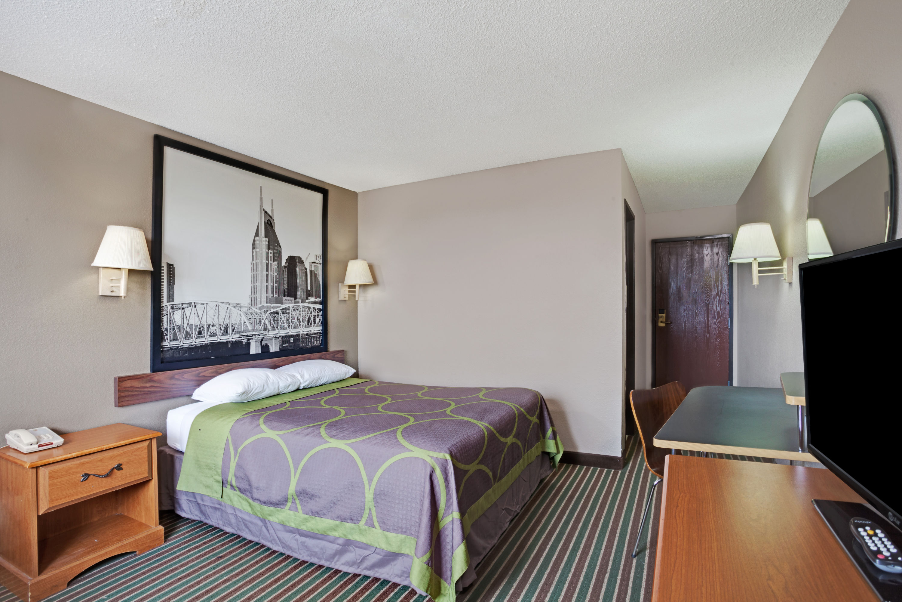 Guest room at the Super 8 by Wyndham Nashville/ Dntn/ Opryland Area in Nashville, Tennessee