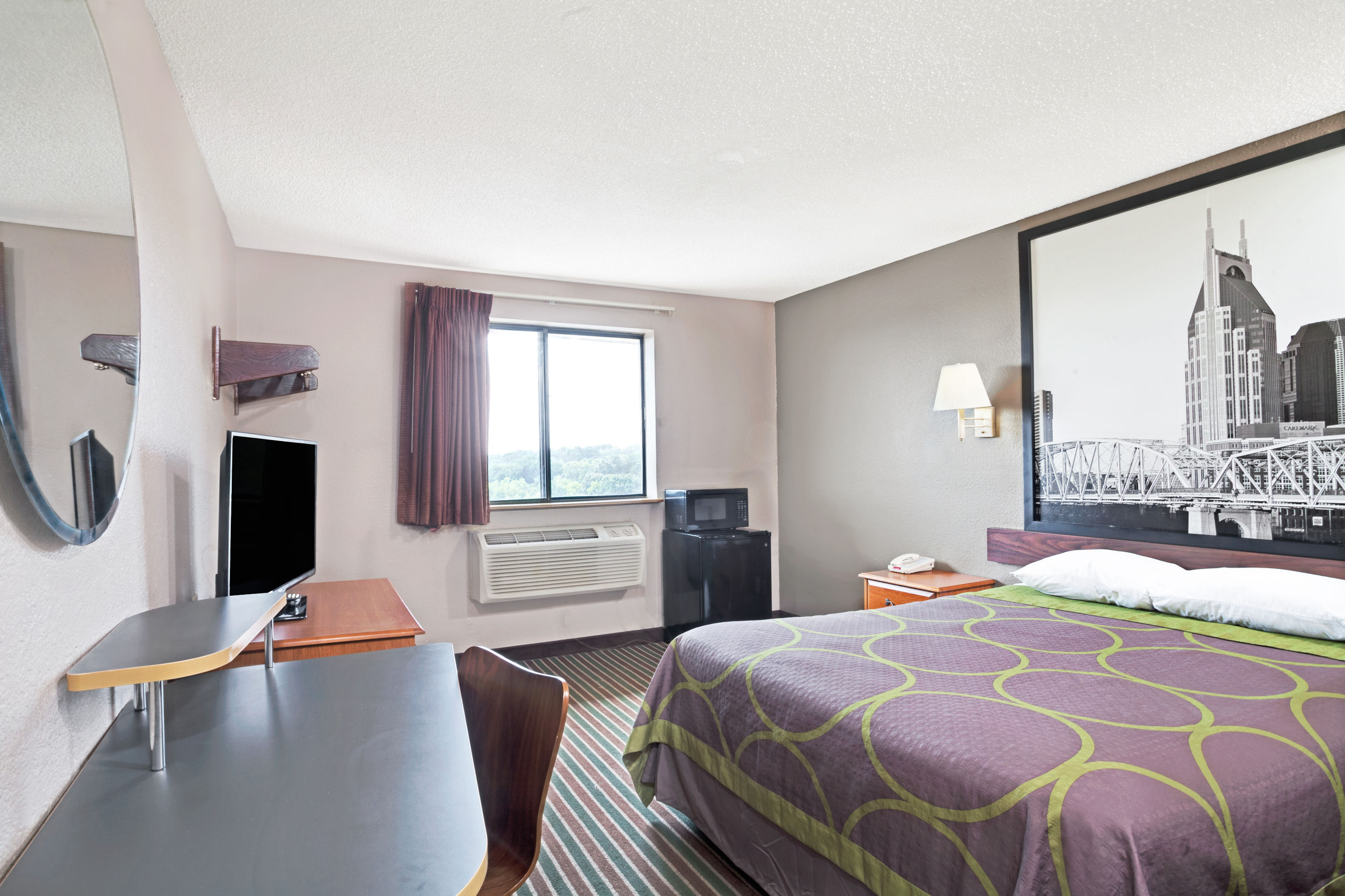 Guest room at the Super 8 by Wyndham Nashville/ Dntn/ Opryland Area in Nashville, Tennessee