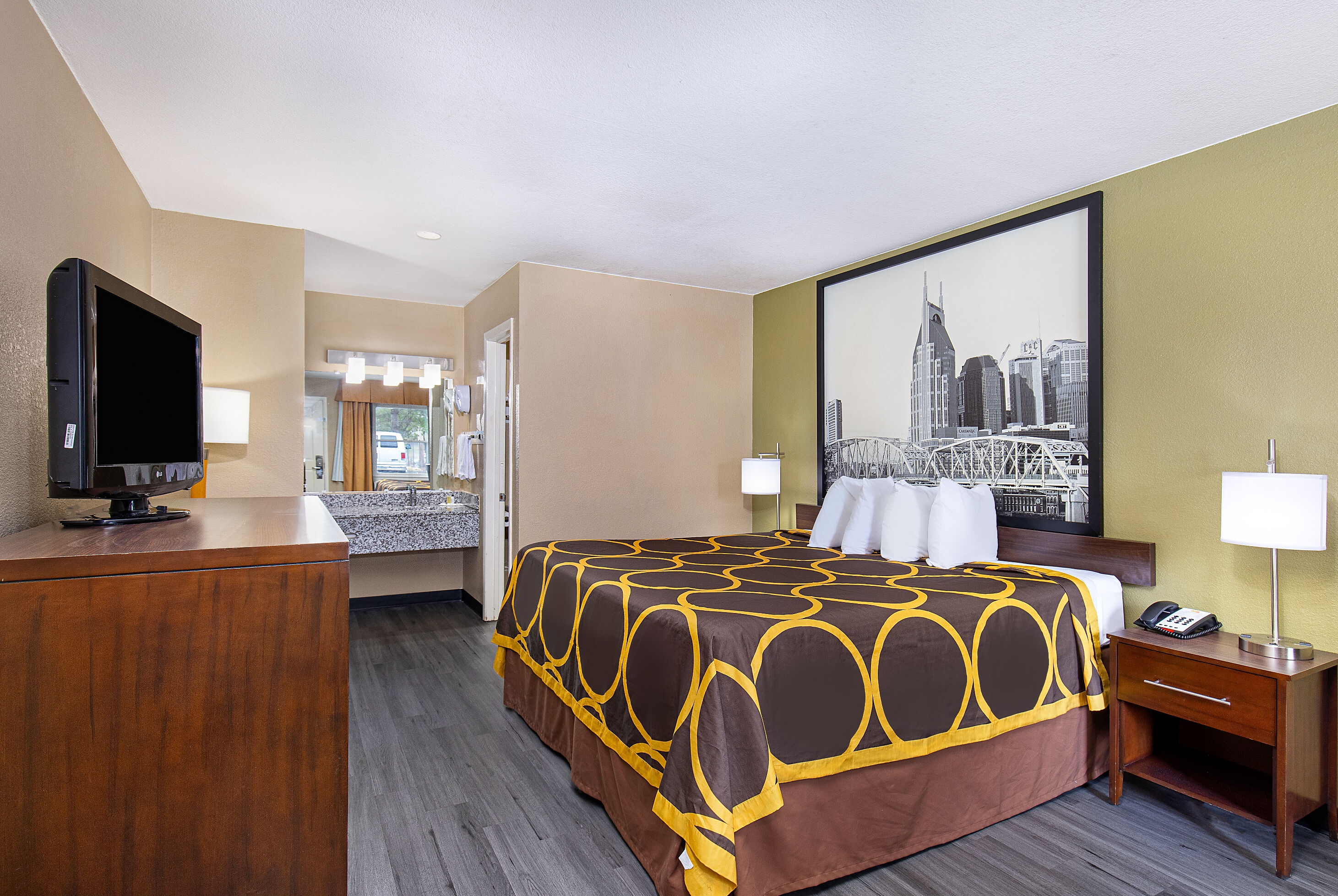 King bed guest room at the Super 8 by Wyndham Nashville West in Nashville, Tennessee