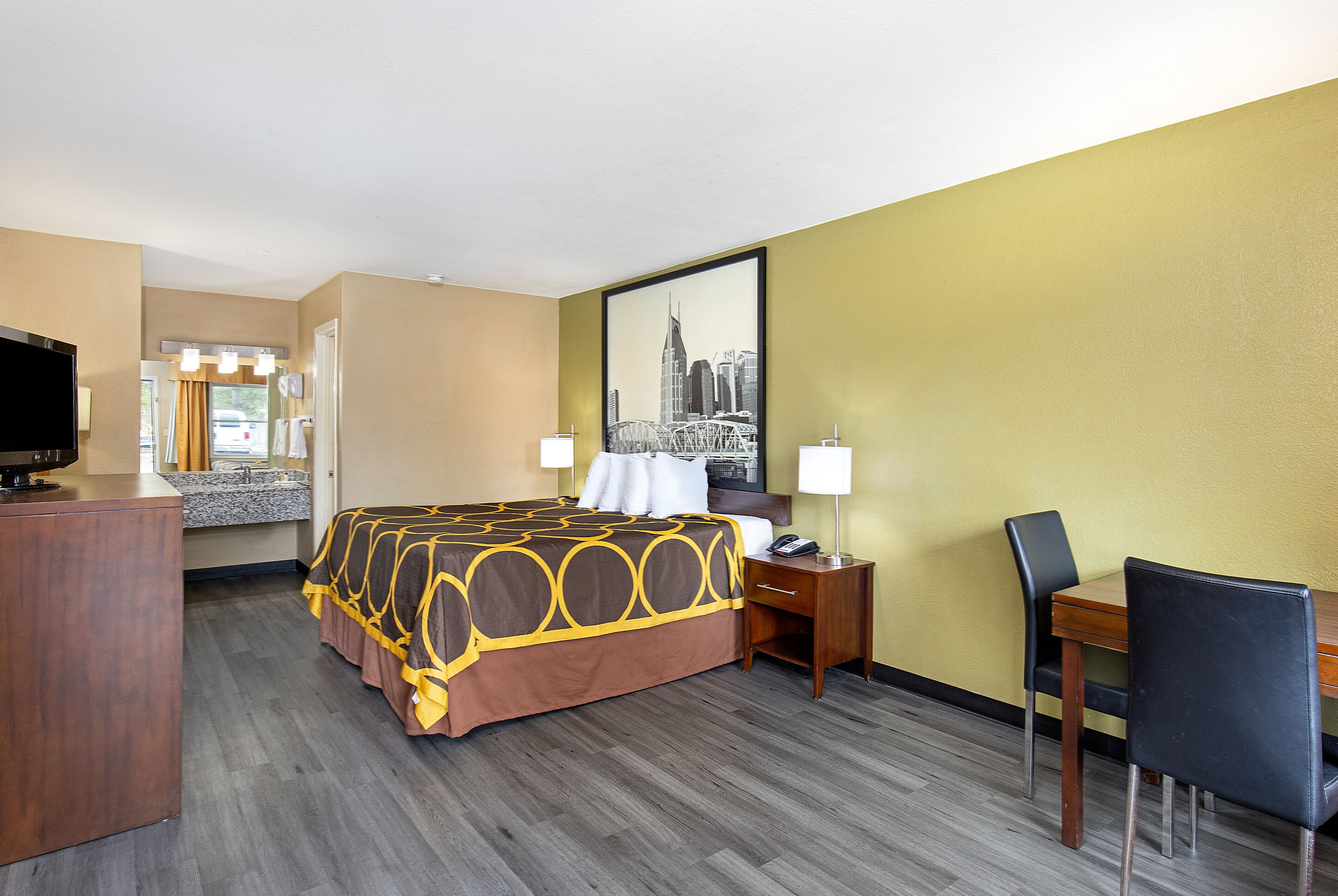 King bed guest room at the Super 8 by Wyndham Nashville West in Nashville, Tennessee