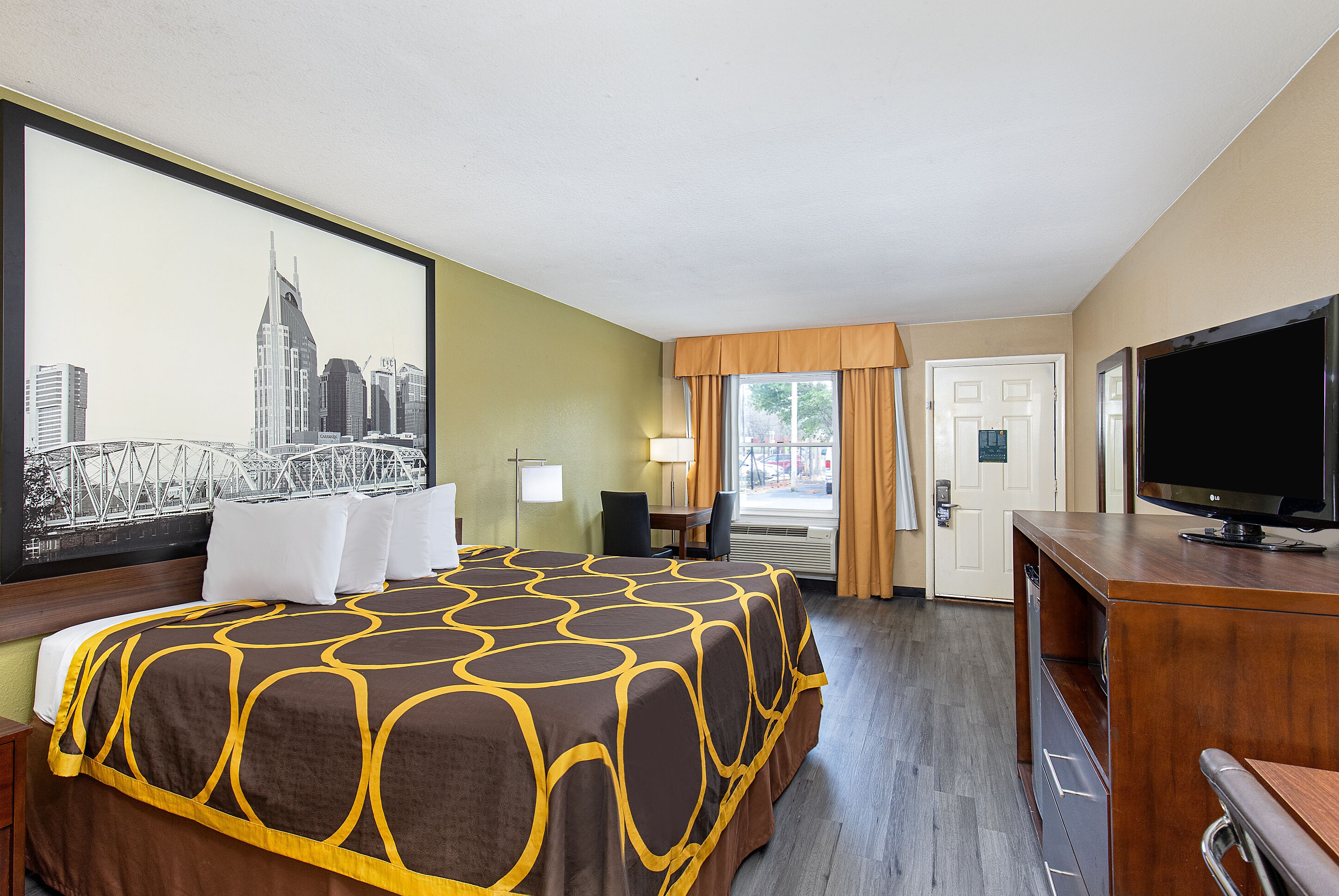 King bed guest room at the Super 8 by Wyndham Nashville West in Nashville, Tennessee