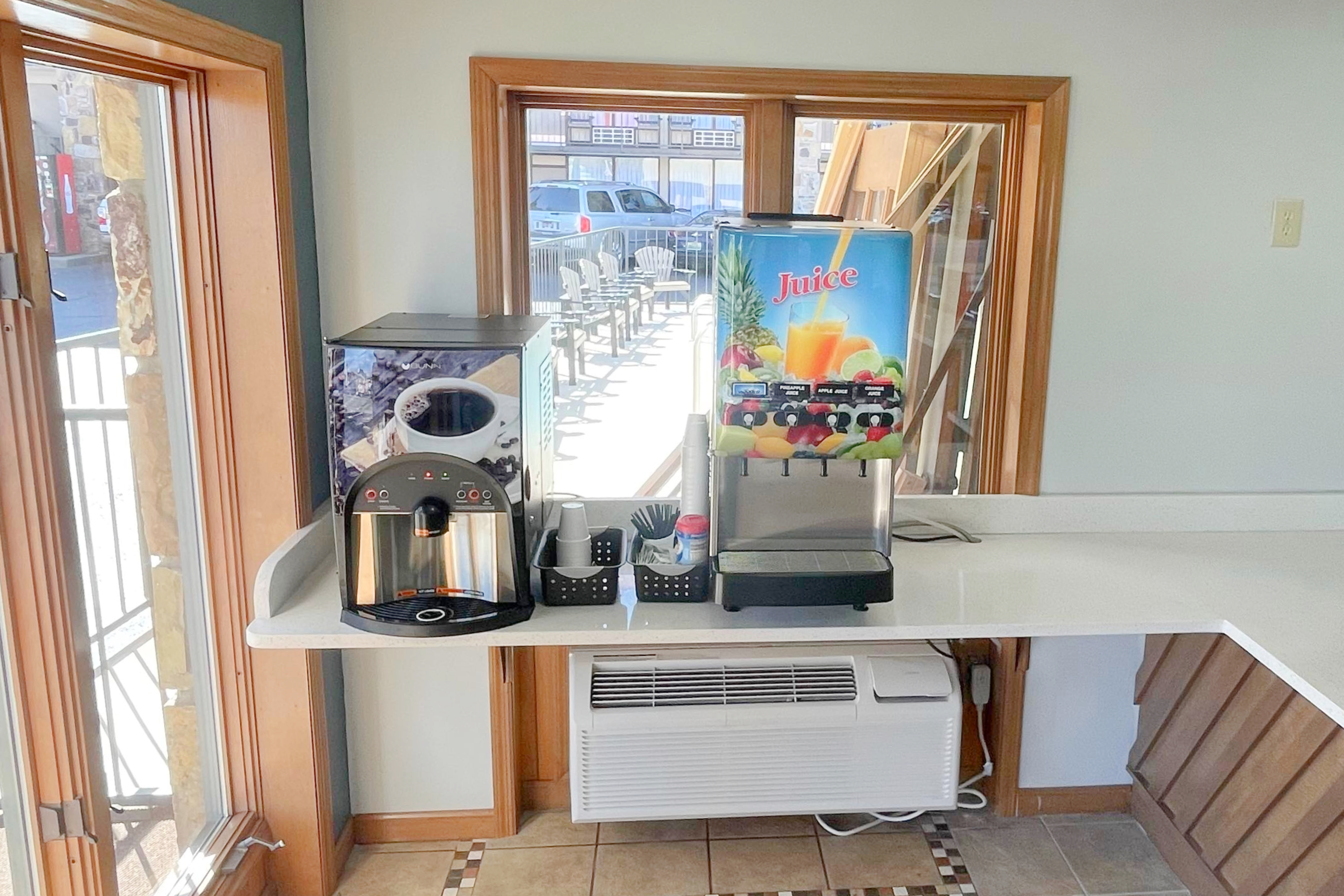 Super 8 by Wyndham Pigeon Forge Downtown restaurant breakfast area close up in Pigeon Forge, Tennessee