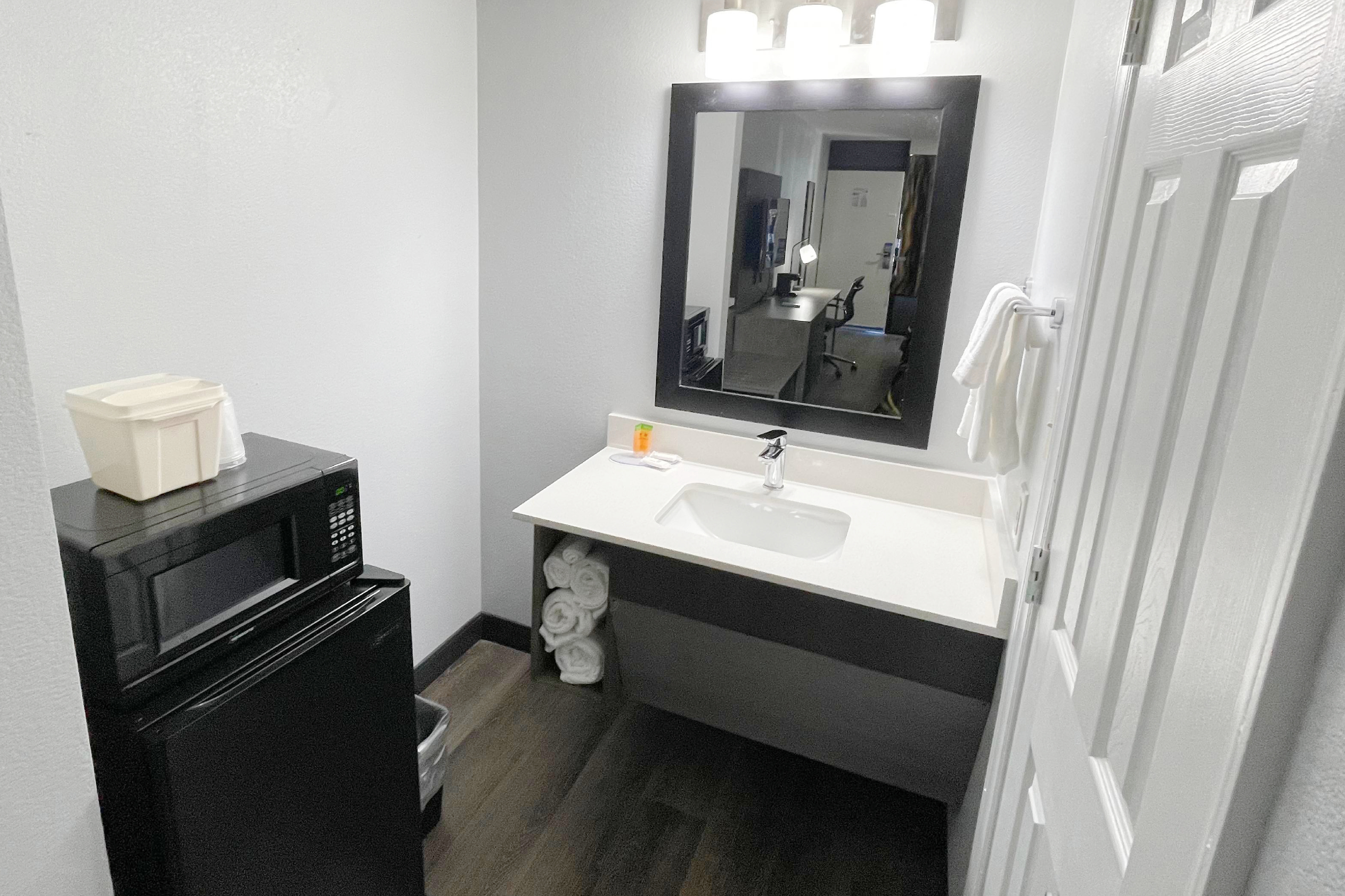 Guest room bath at the Super 8 by Wyndham Pigeon Forge Downtown in Pigeon Forge, Tennessee