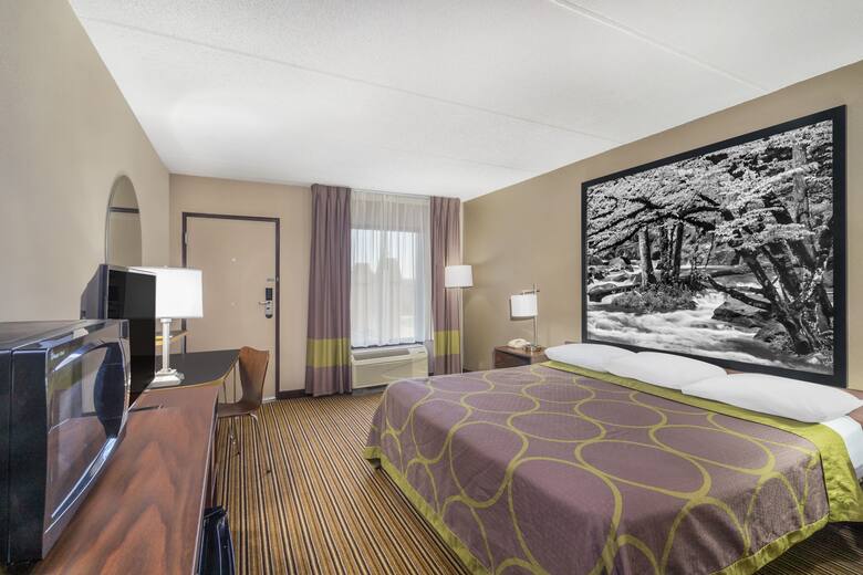 Guest room at the Super 8 Knoxville North/Powell in Powell, Tennessee