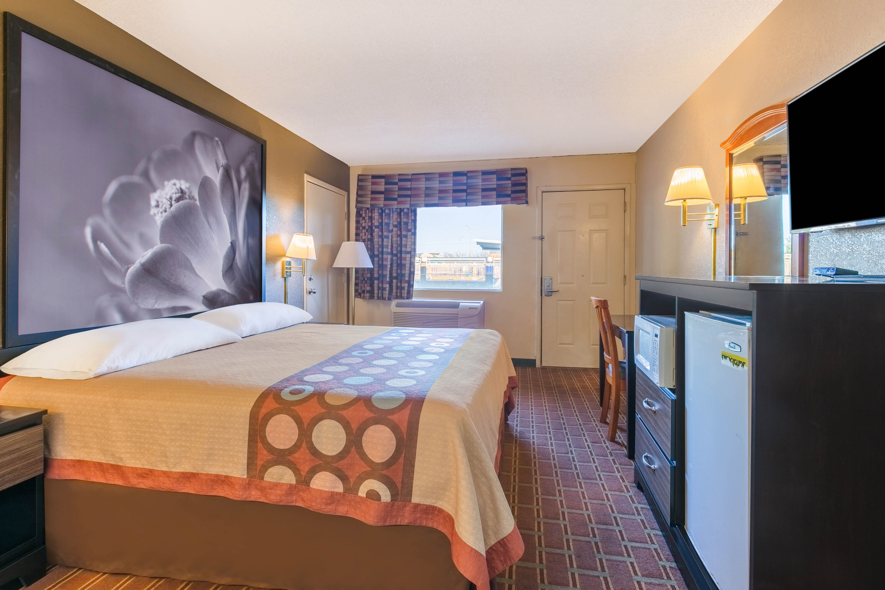 Guest room at the Super 8 by Wyndham Abilene North in Abilene, Texas