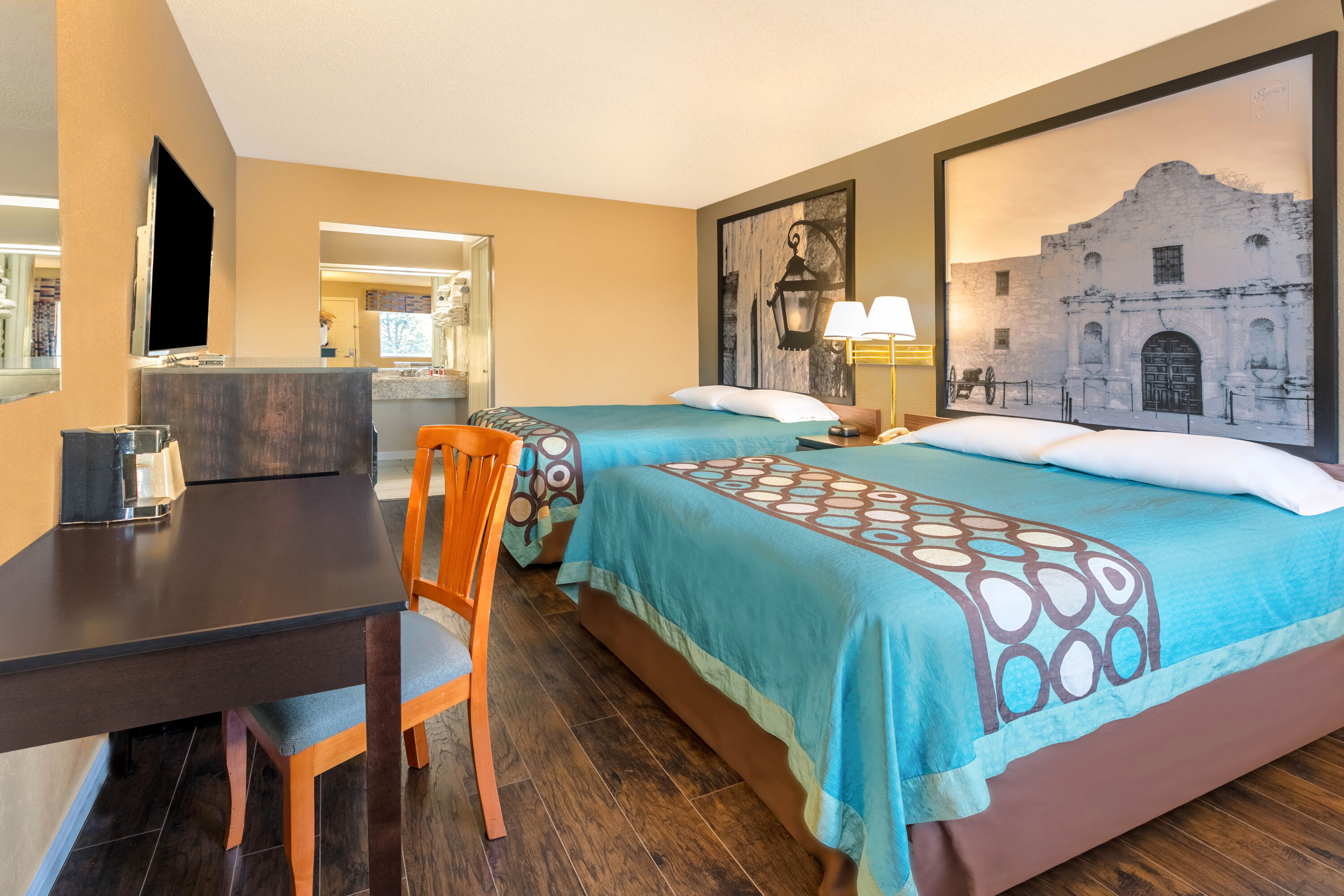 Guest room at the Super 8 by Wyndham Abilene North in Abilene, Texas