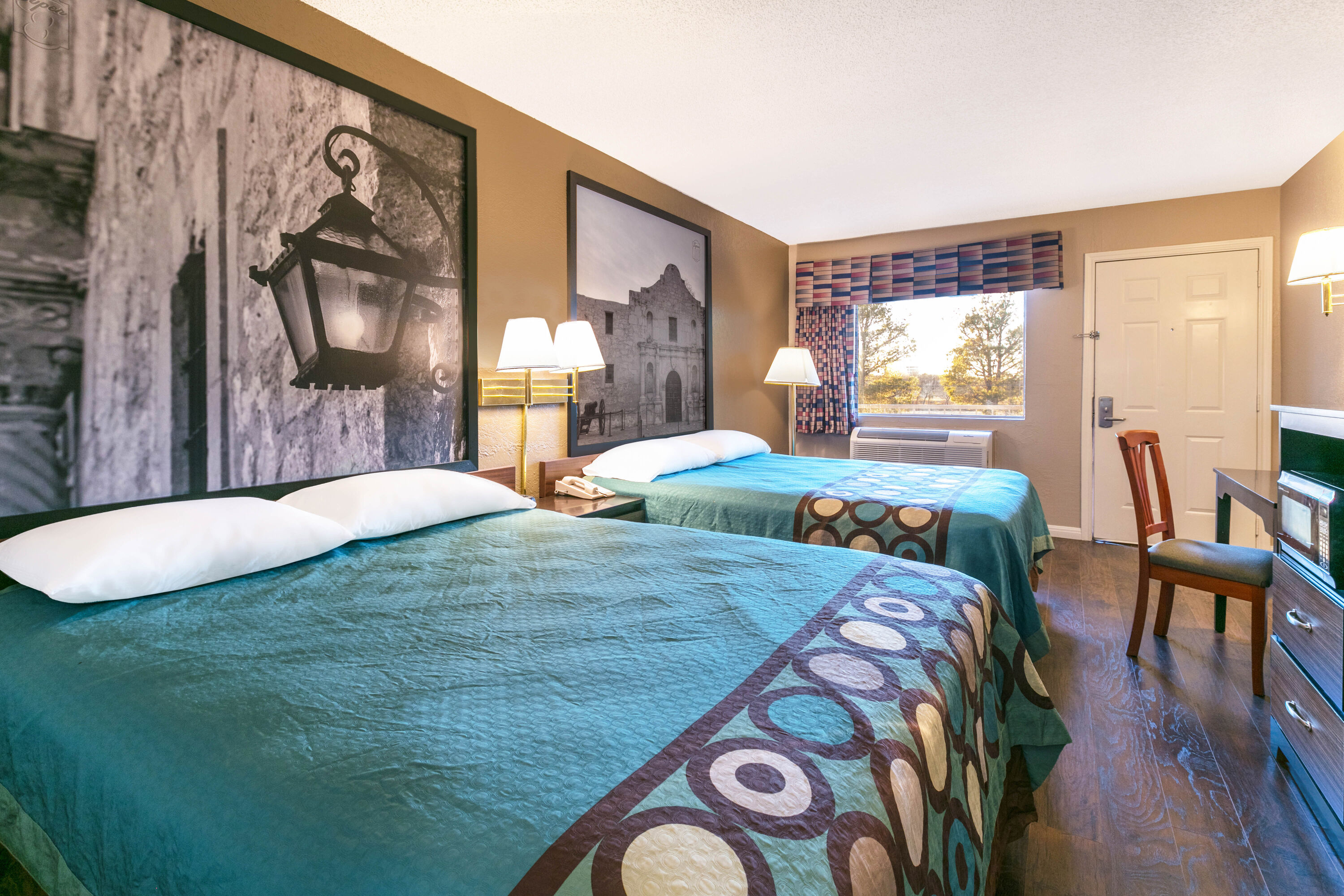 Guest room at the Super 8 by Wyndham Abilene North in Abilene, Texas