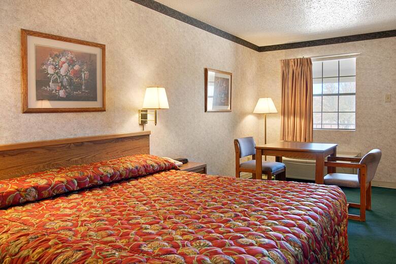 Guest room at the Super 8 By The Galleria / North Dallas in Addison, Texas