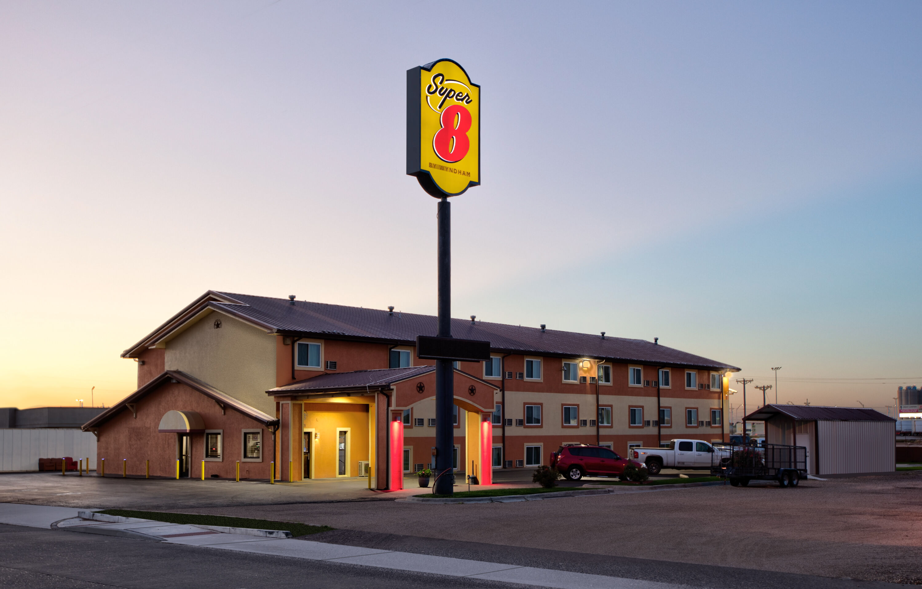 Exterior Dusk Image of Super 8 by Wyndham Amarillo East hotel in Amarillo, Texas